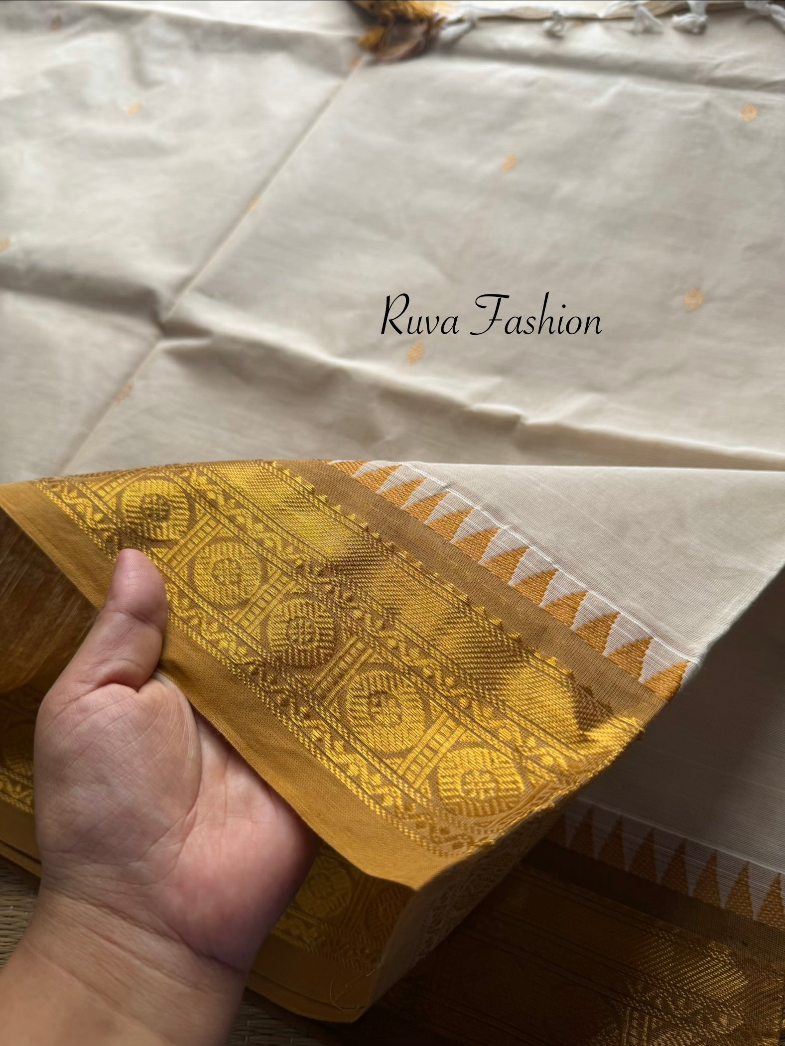 Cream with mustard combination Kanchi cotton saree with rich Zari woven Pallu and handmade golden Zari Buttas