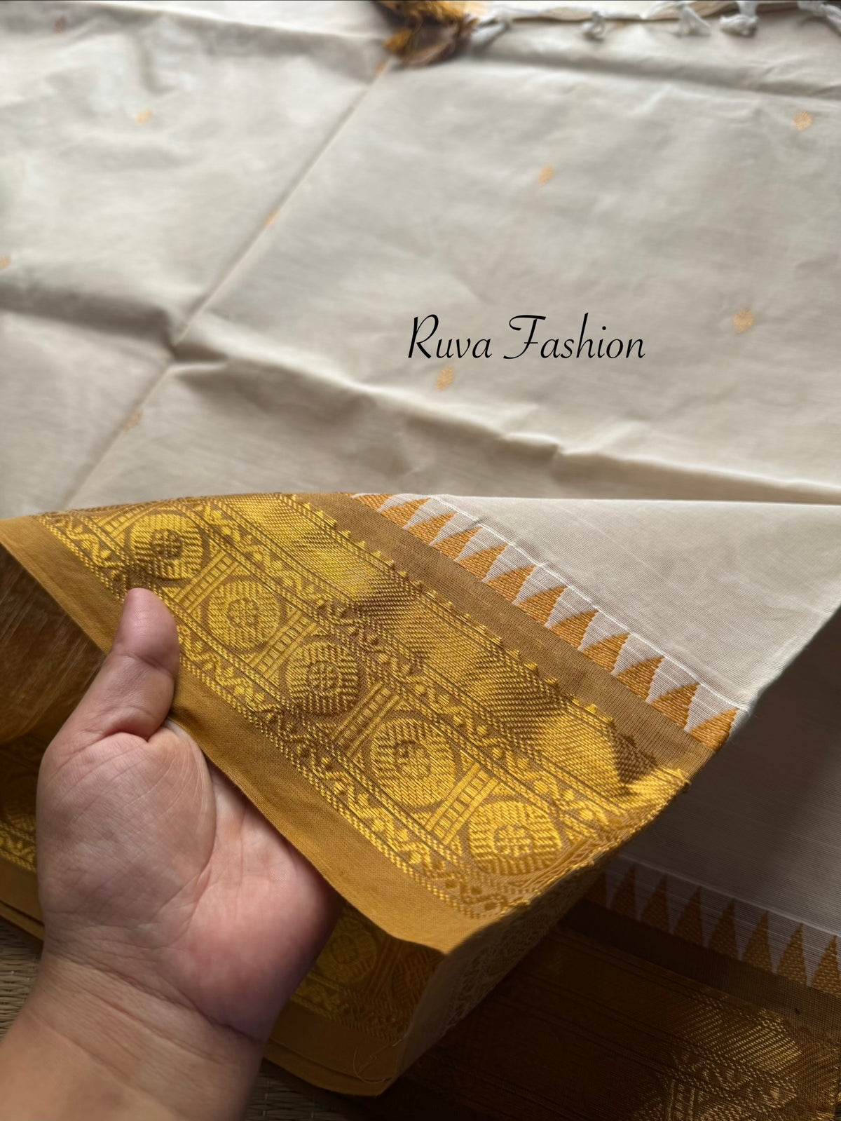 Cream with mustard combination Kanchi cotton saree with rich Zari woven Pallu and handmade golden Zari Buttas