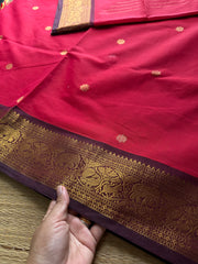 Premium Kanchi Cotton Saree : Reddish maroon with brown combination Kanchi Cotton Saree With Unique Vanasingaram Border and simple zari woven mango Motif Pallu