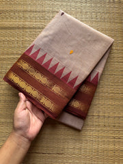 Beige shade Kanchi cotton saree with handmade thread buttas