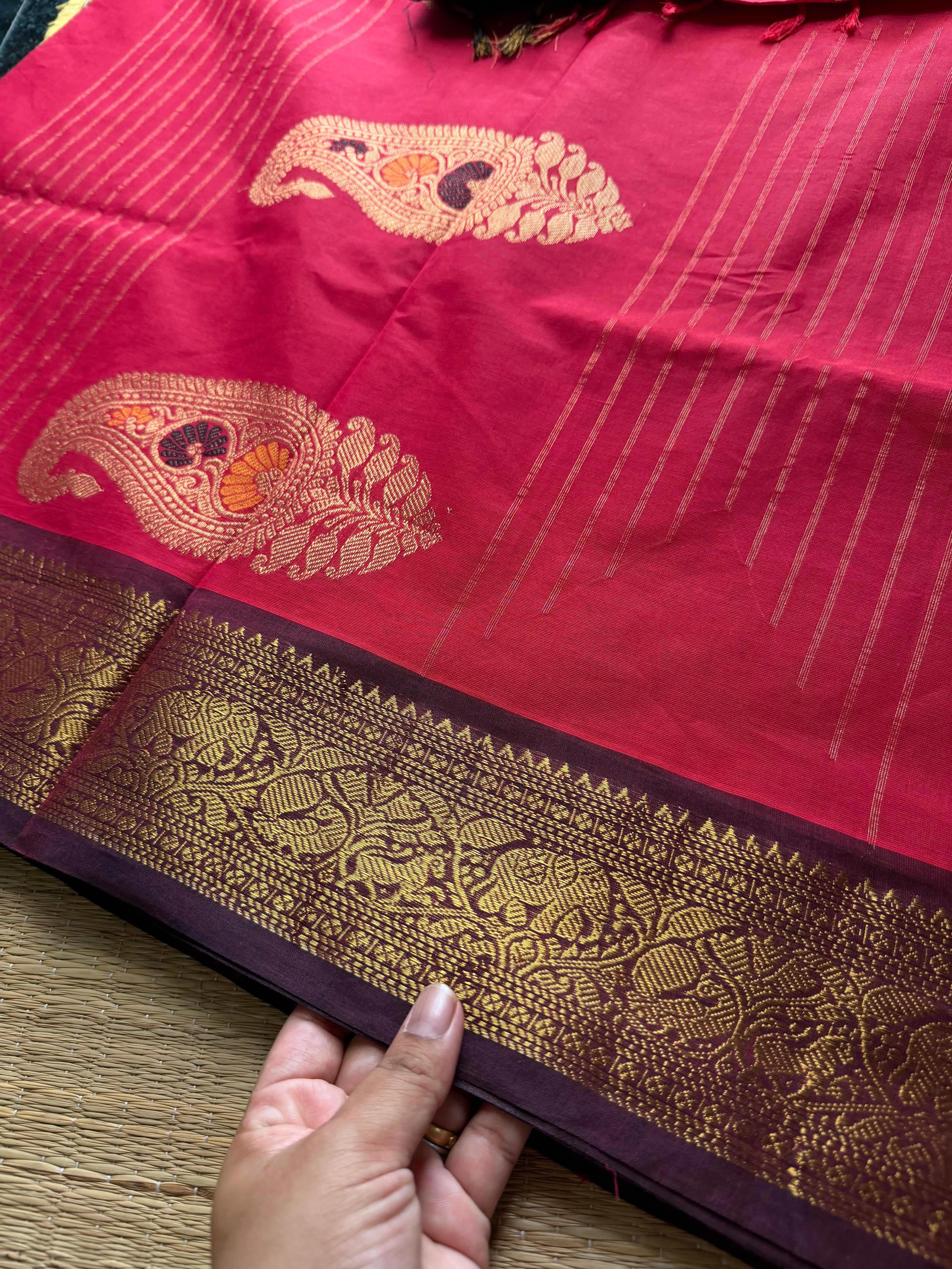 Premium Kanchi Cotton Saree : Reddish maroon with brown combination Kanchi Cotton Saree With Unique Vanasingaram Border and simple zari woven mango Motif Pallu