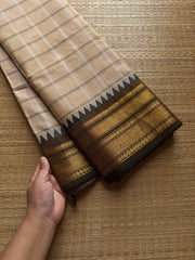 Cream shade kanchi saree with kattam / checks pattern & handmade golden Zari buttas