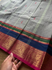 Dual tone grey shade Kanchi cotton saree with multi color contrast border and handmade thread buttas