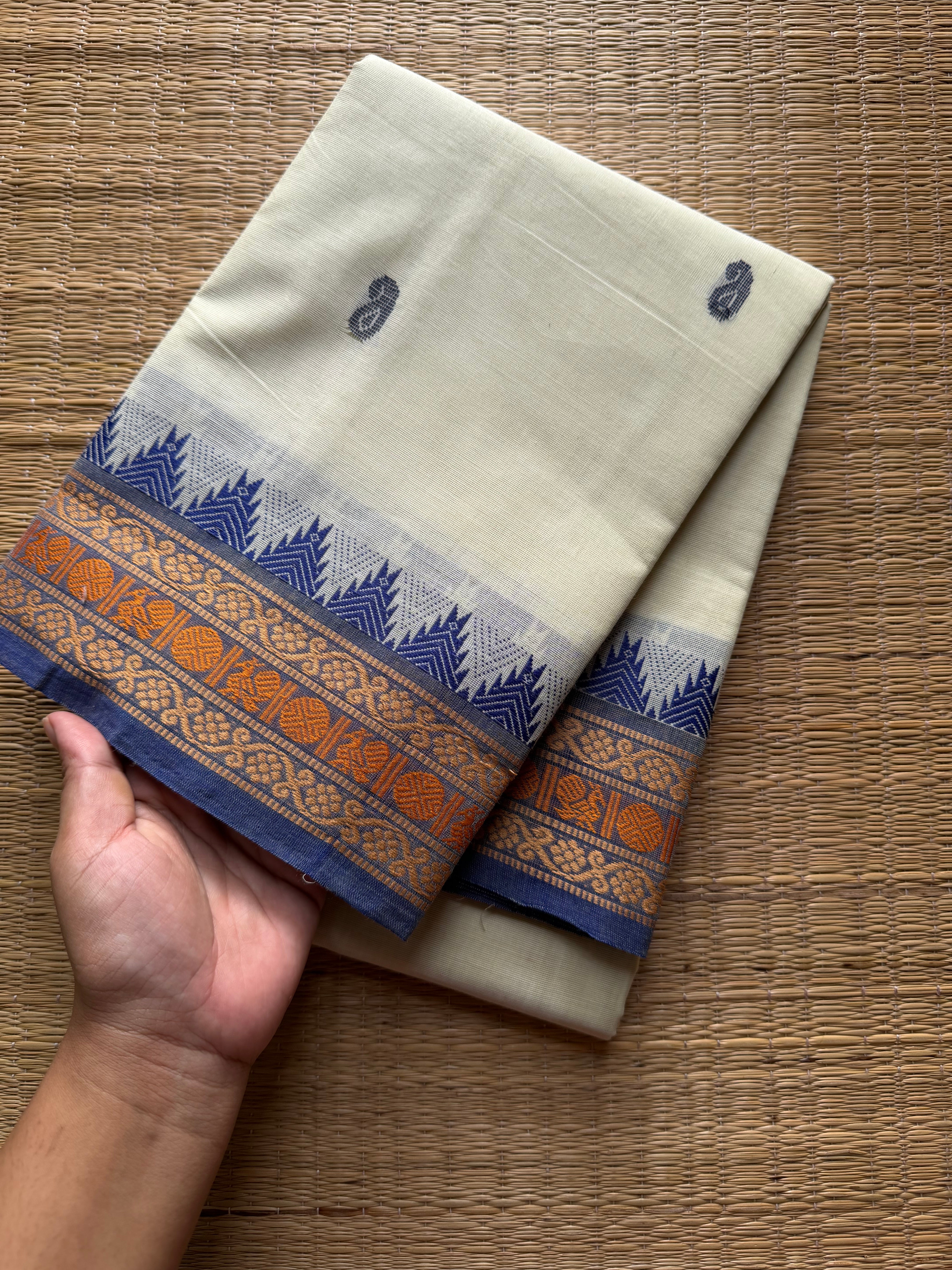Elegant Thread Border ~ Pastel shade Kanchi Cotton Saree with small Thazhampoo pattern thread border & handmade thread buttas