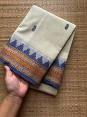 Elegant Thread Border ~ Pastel shade Kanchi Cotton Saree with small Thazhampoo pattern thread border & handmade thread buttas