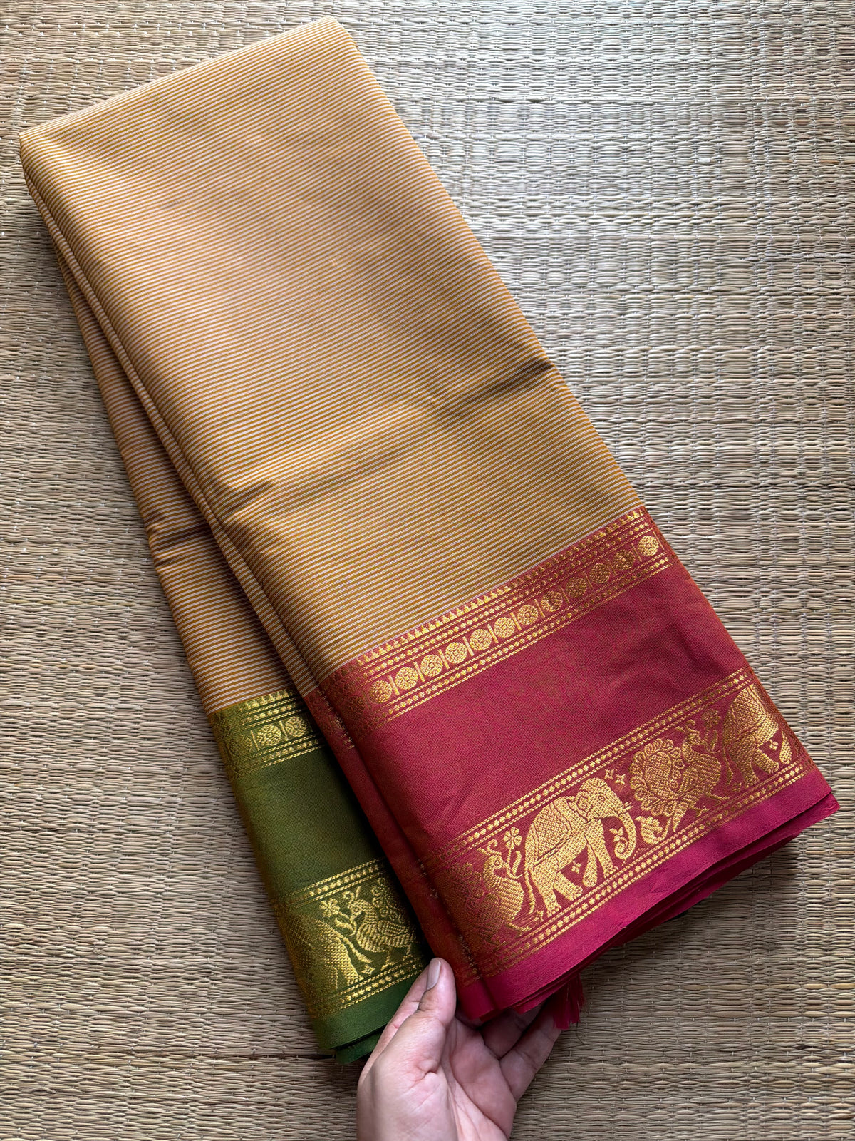 Beige shade Kanchi cotton saree with small horizontal stripped pattern with unique Ganga Jamuna border