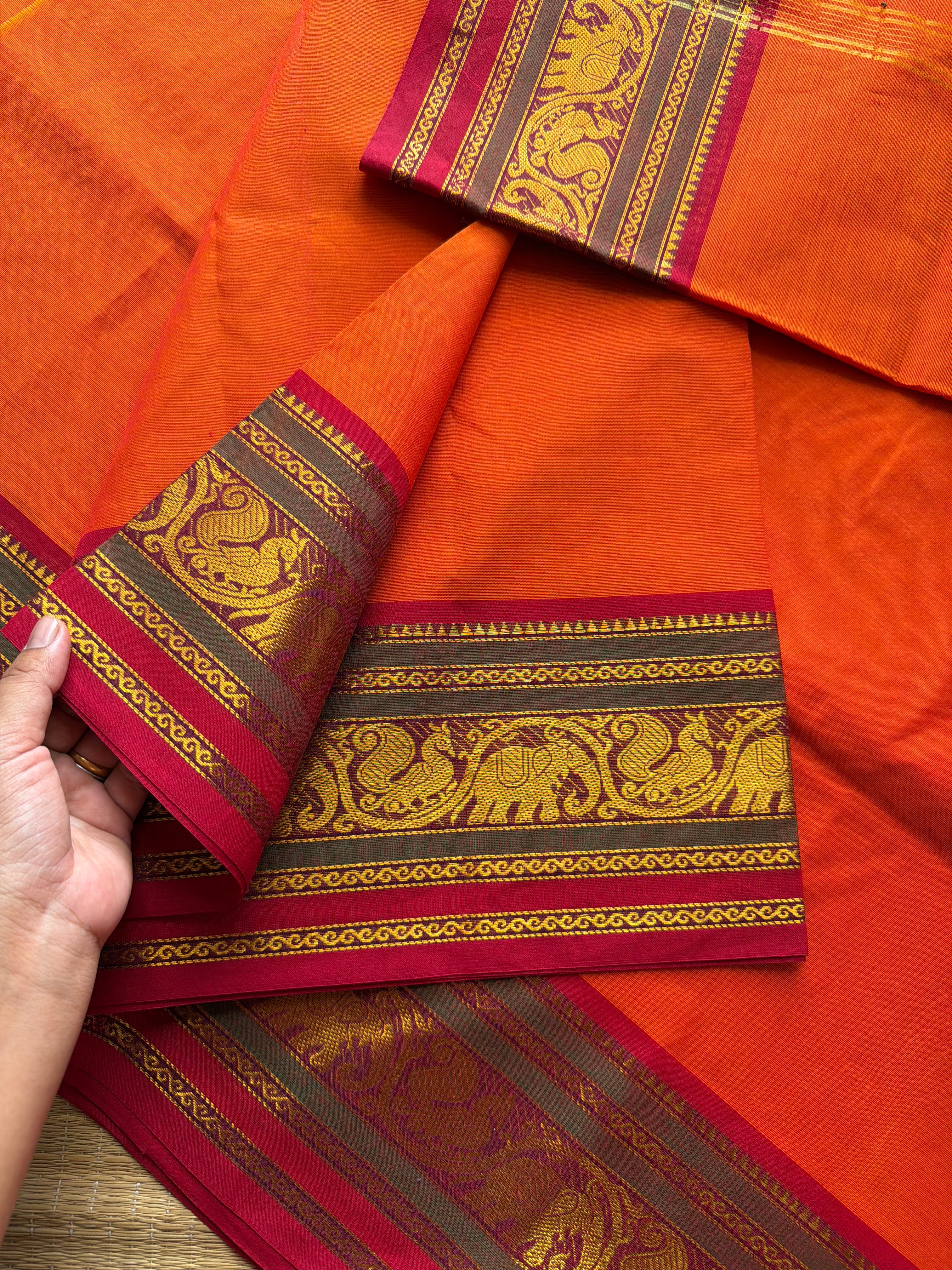 Orange with red & green combination Kanchi cotton saree with Annam & elephant pattern contrast double color border