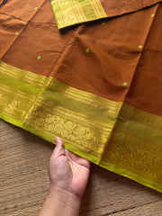 RF591 Rust wood brown shade with lime green combination Kanchi cotton saree with handmade thread buttas & floral pattern border