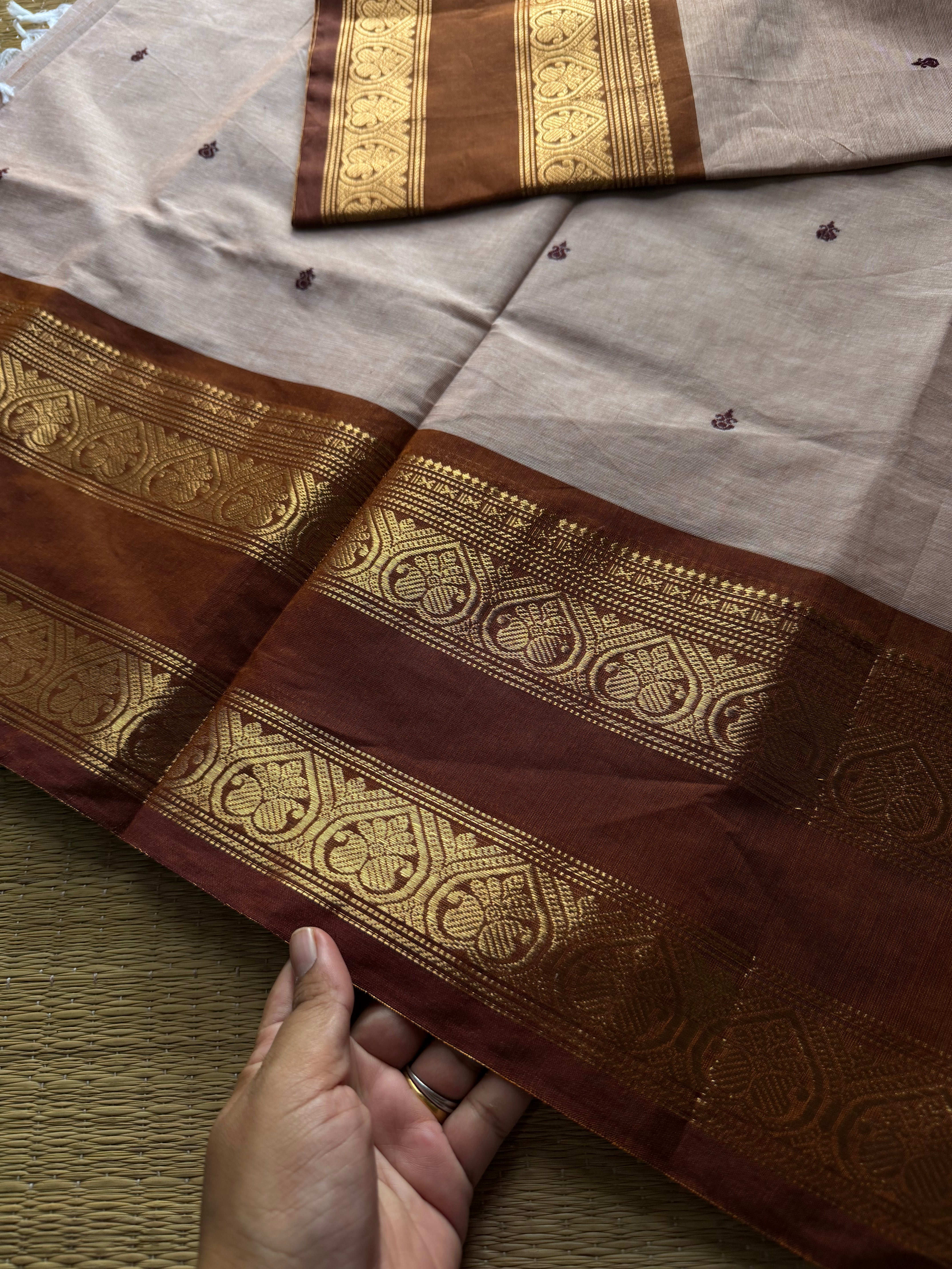 Beige shade Kanchi cotton saree with handmade thread buttas