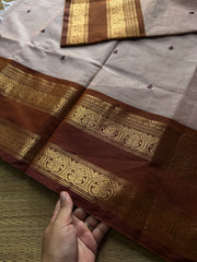 Beige shade Kanchi cotton saree with handmade thread buttas