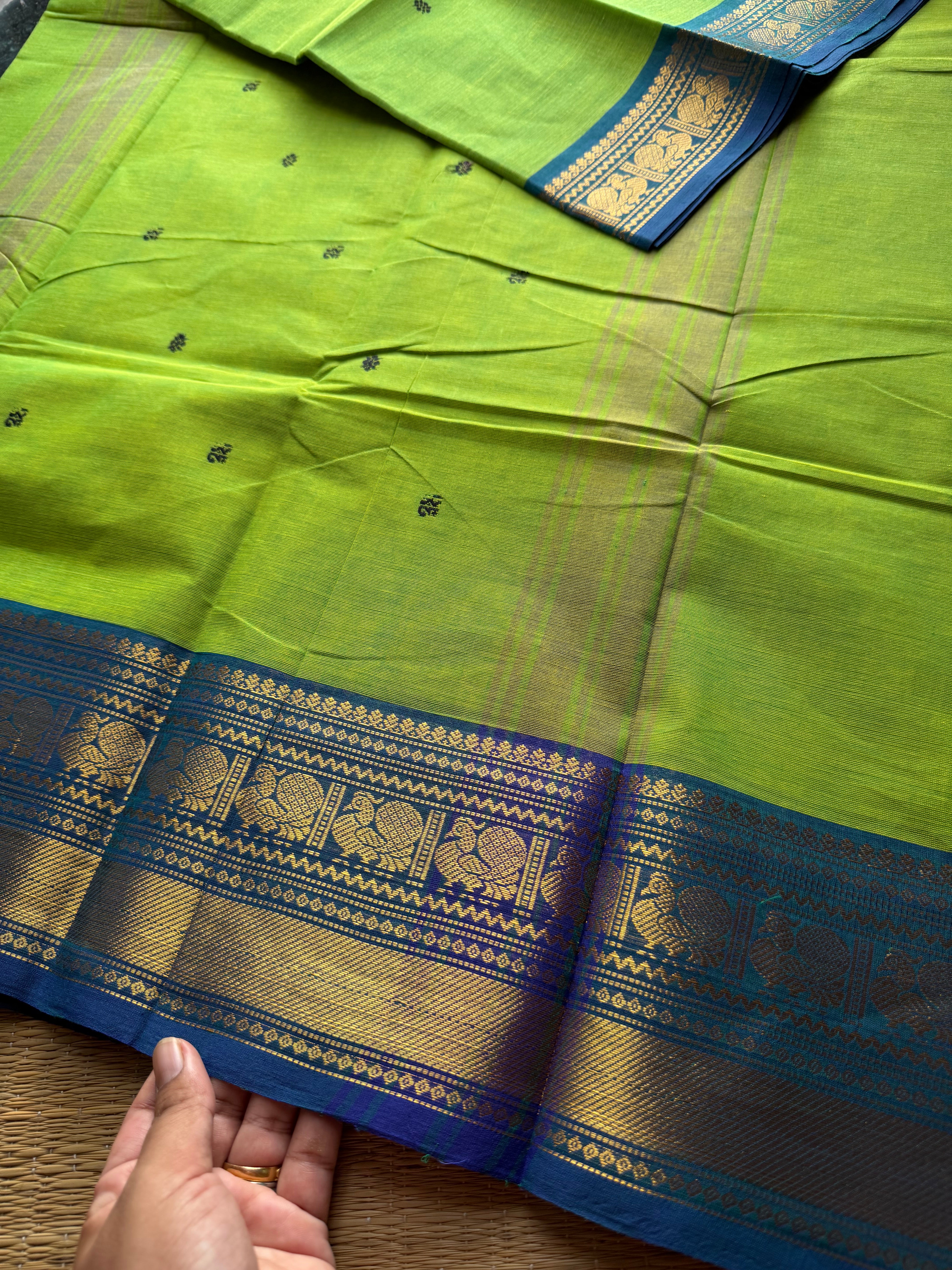 Green with blue combination Kanchi cotton saree with handmade thread buttas