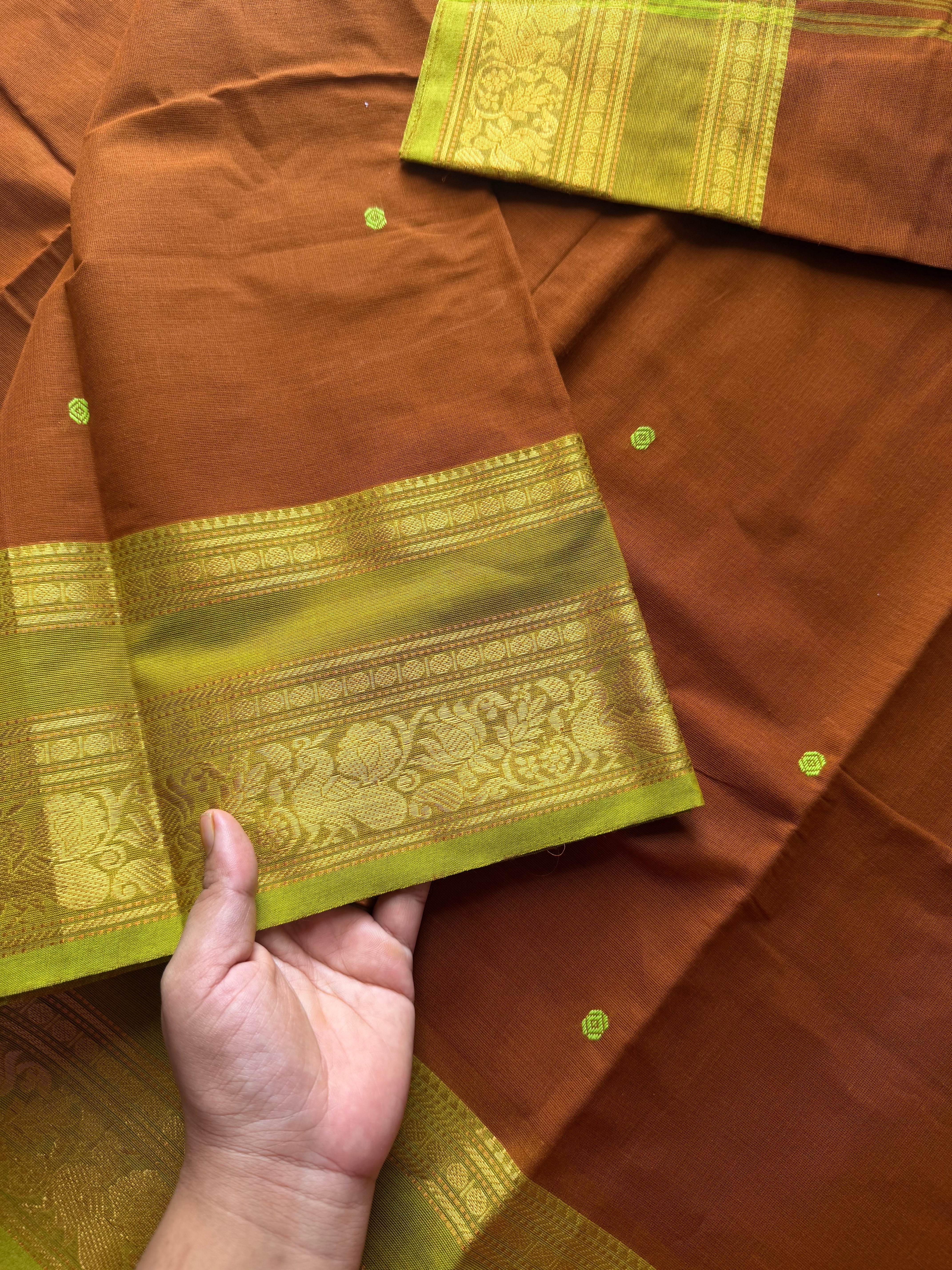 RF591 Rust wood brown shade with lime green combination Kanchi cotton saree with handmade thread buttas & floral pattern border