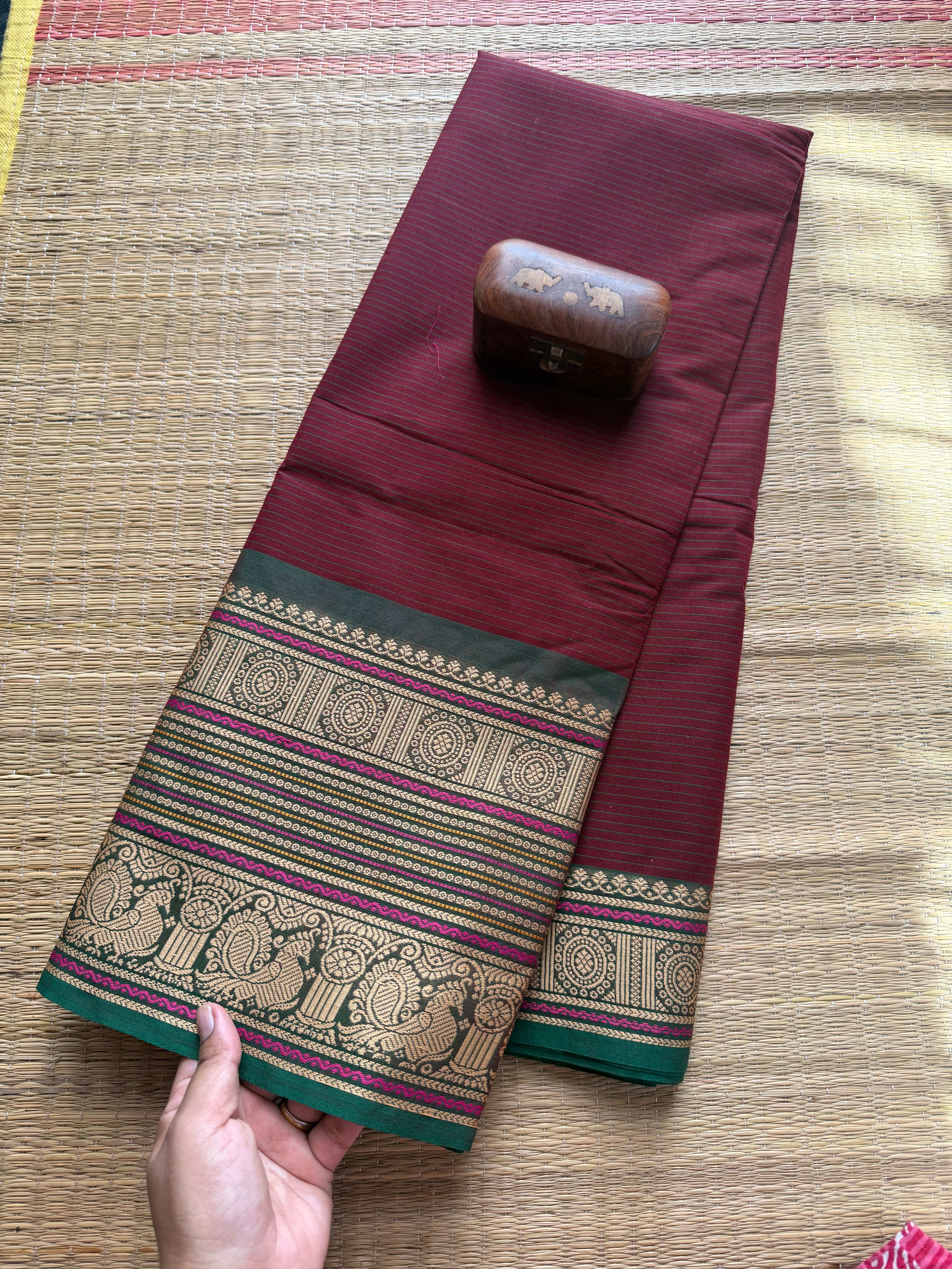 Maroon Shade Small Stripped Pattern Kanchi Cotton Saree With Intricate Thread Woven Border