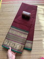 Maroon Shade Small Stripped Pattern Kanchi Cotton Saree With Intricate Thread Woven Border