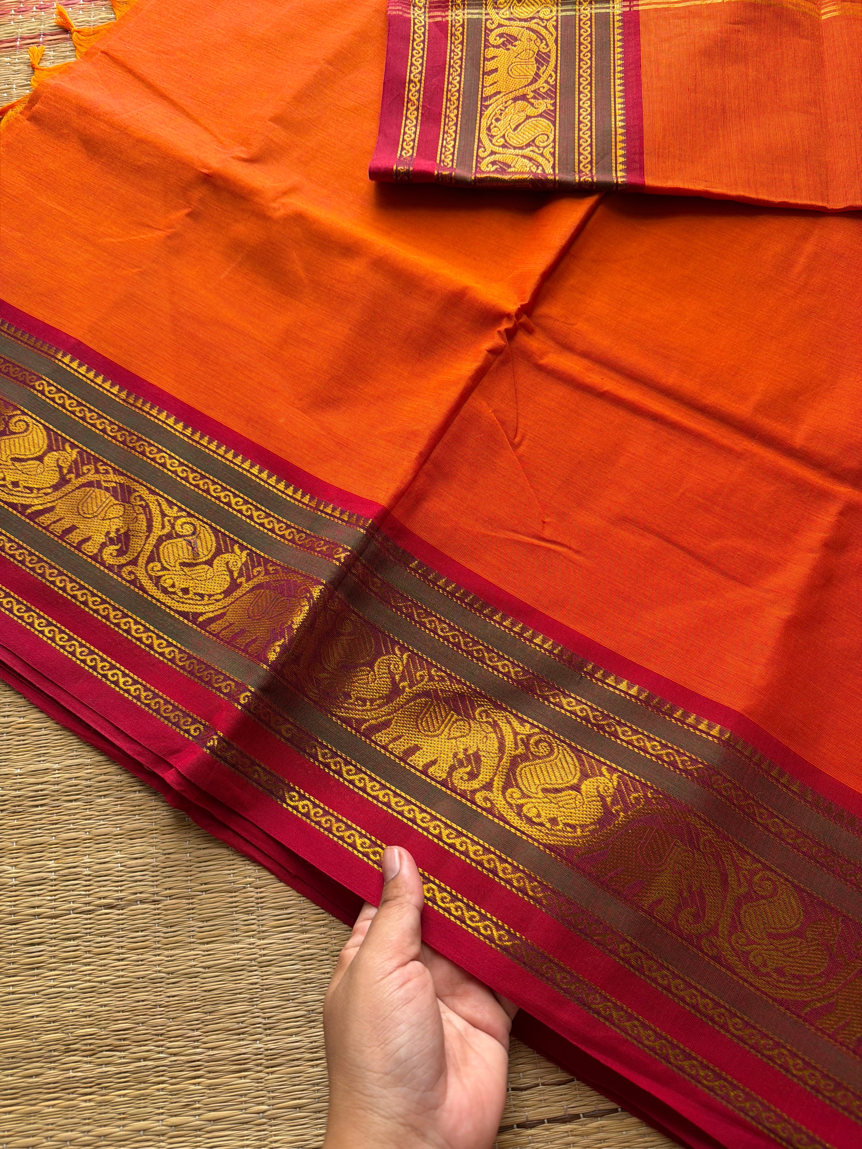 Orange with red & green combination Kanchi cotton saree with Annam & elephant pattern contrast double color border