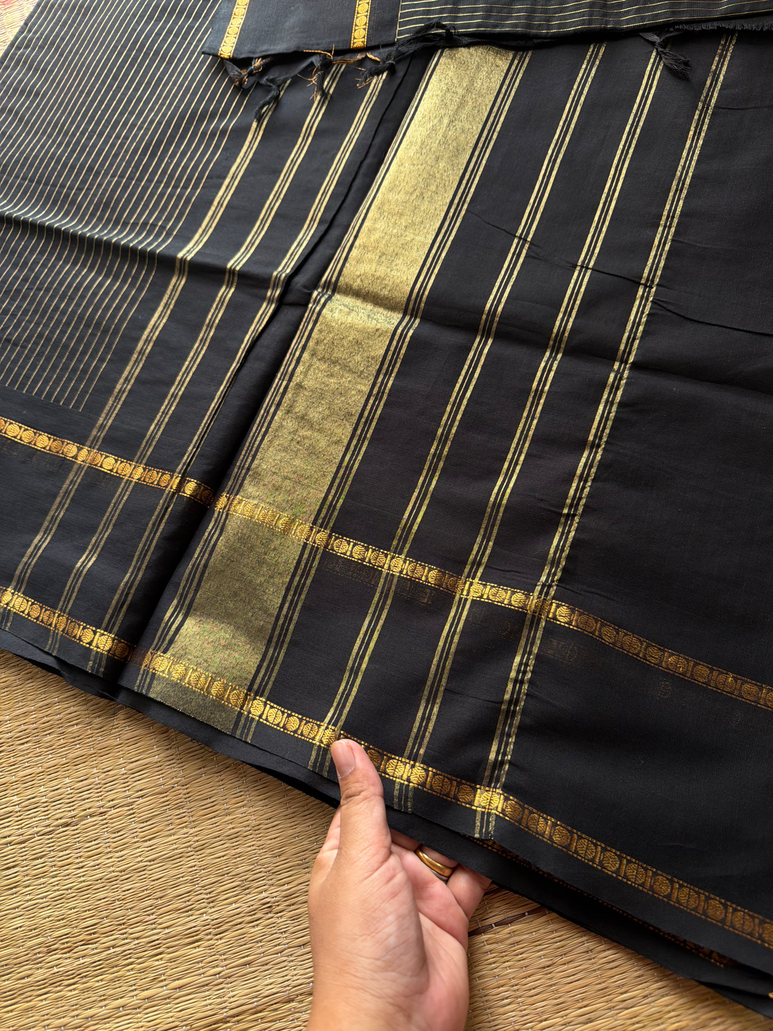 Monotone black shade Kanchi cotton saree with vintage gap border and fully golden Vairaoosi pattern