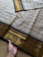 Cream shade kanchi saree with kattam / checks pattern & handmade golden Zari buttas