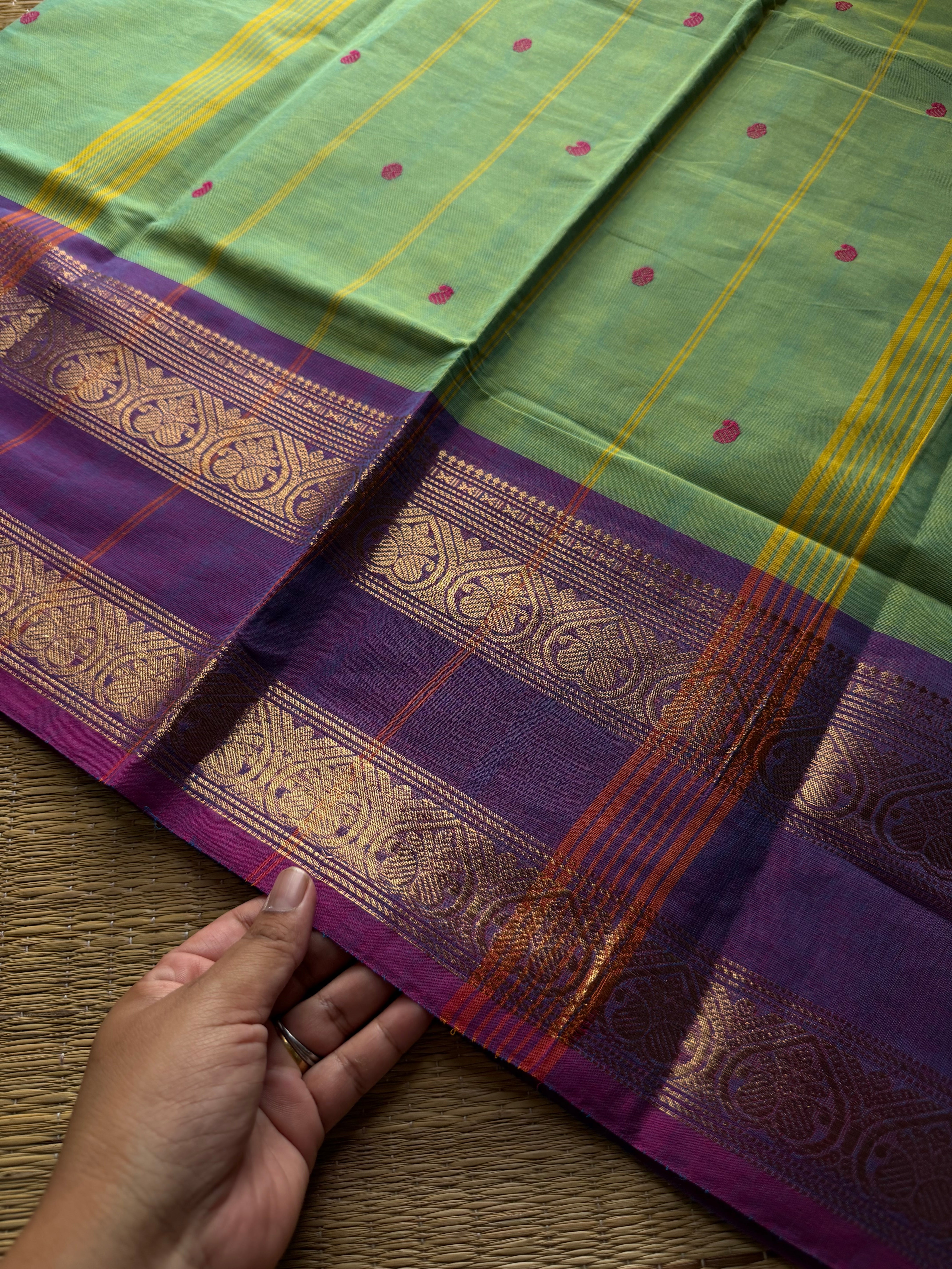 Apple green shade Kanchi cotton saree with handmade thread buttas
