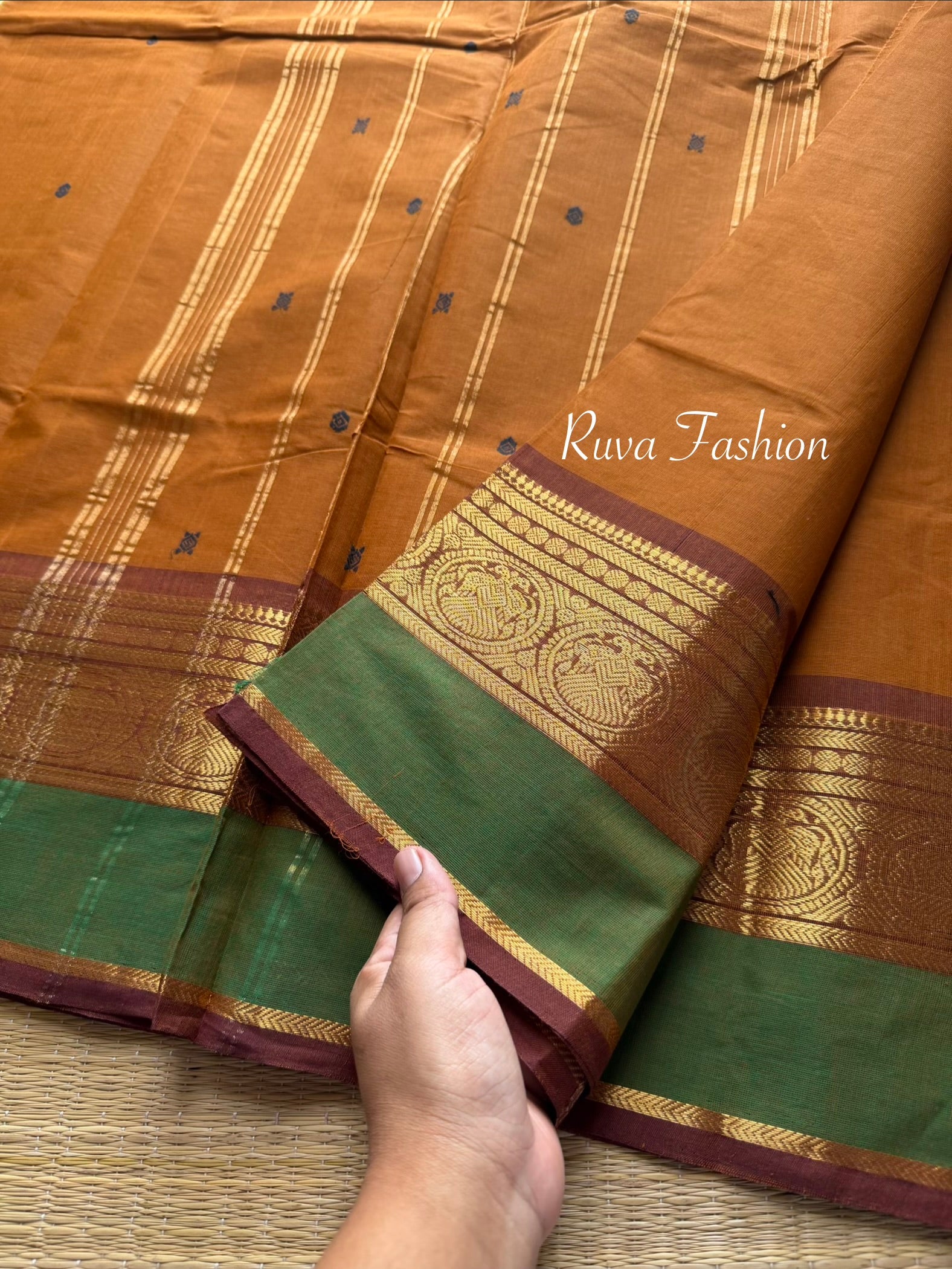 Dual shade of honey shade with contrast green and brown border with handmade thread buttas