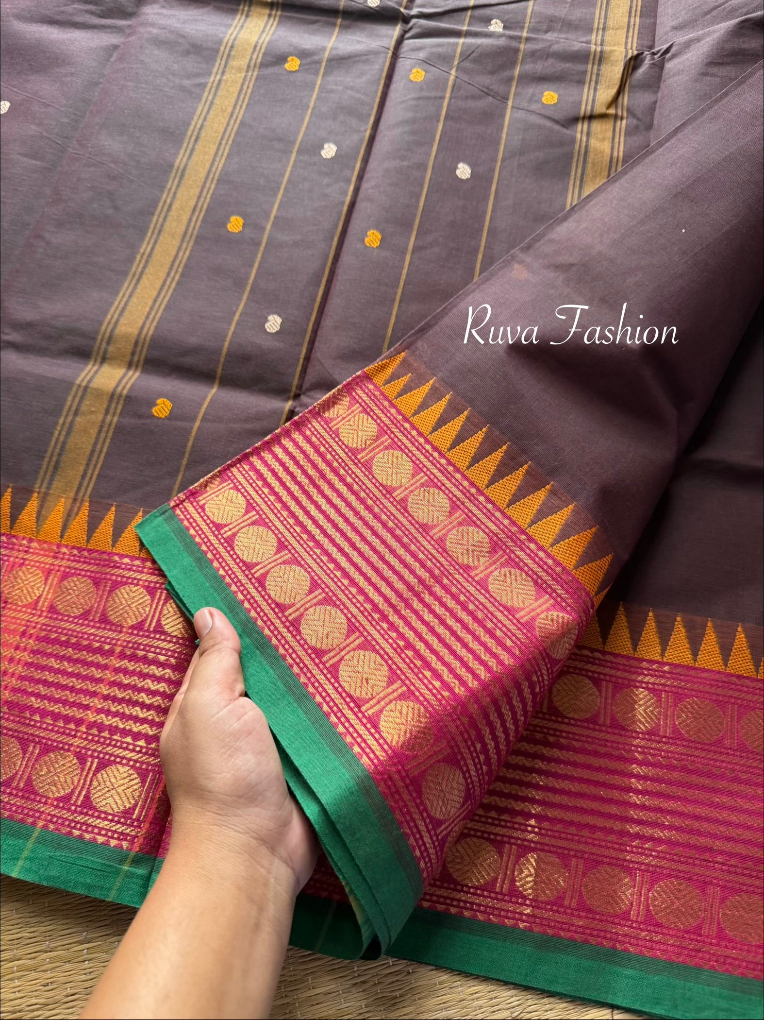 Brown shade Kanchi cotton saree with unique contrast border and handmade thread buttas
