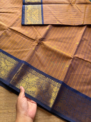 RF191 Dual tone mustard brown With contrast navy blue combination Vanasingaram border Kanchi cotton saree with striped pattern & handmade thread buttas
