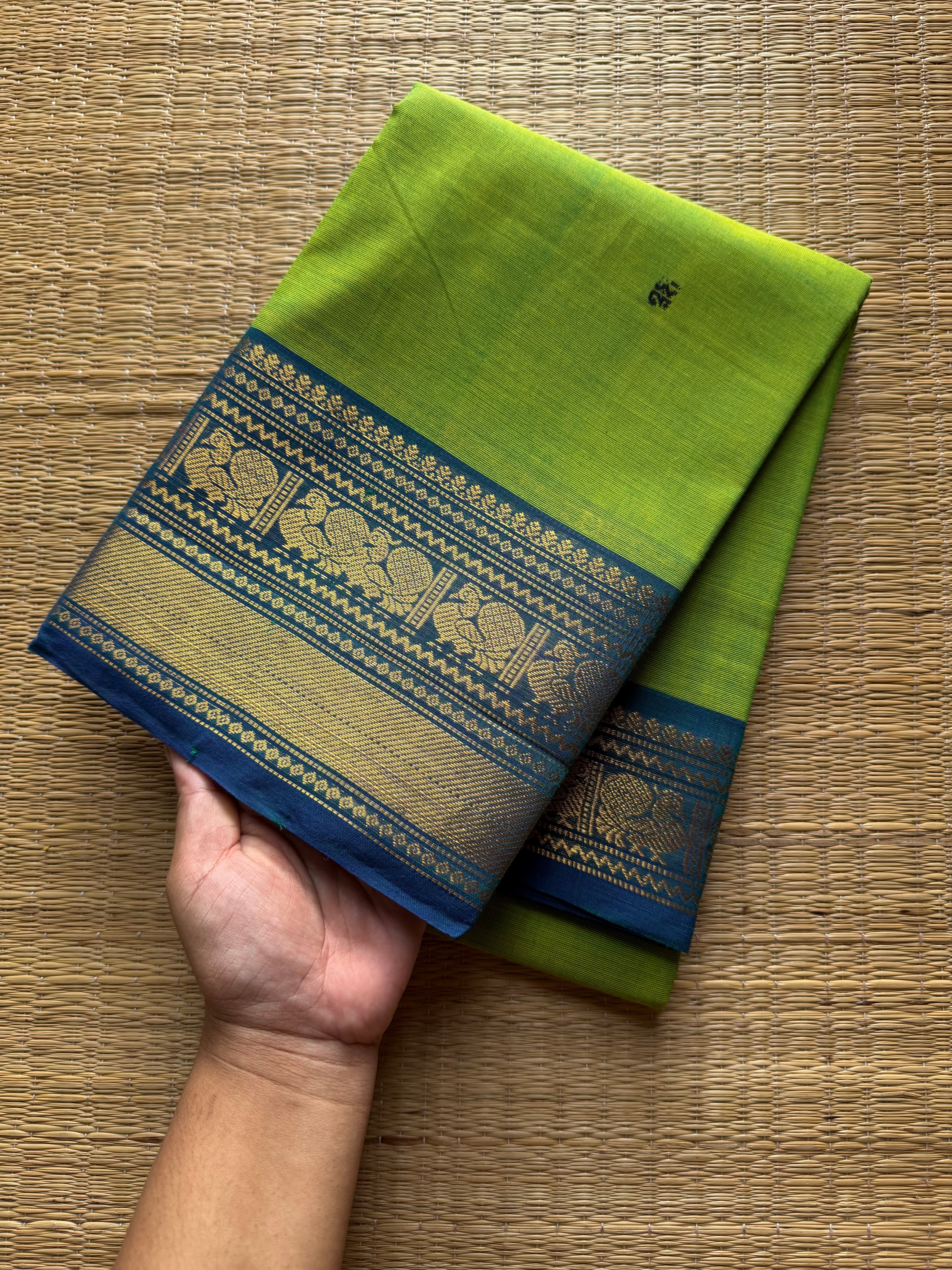 Green with blue combination Kanchi cotton saree with handmade thread buttas