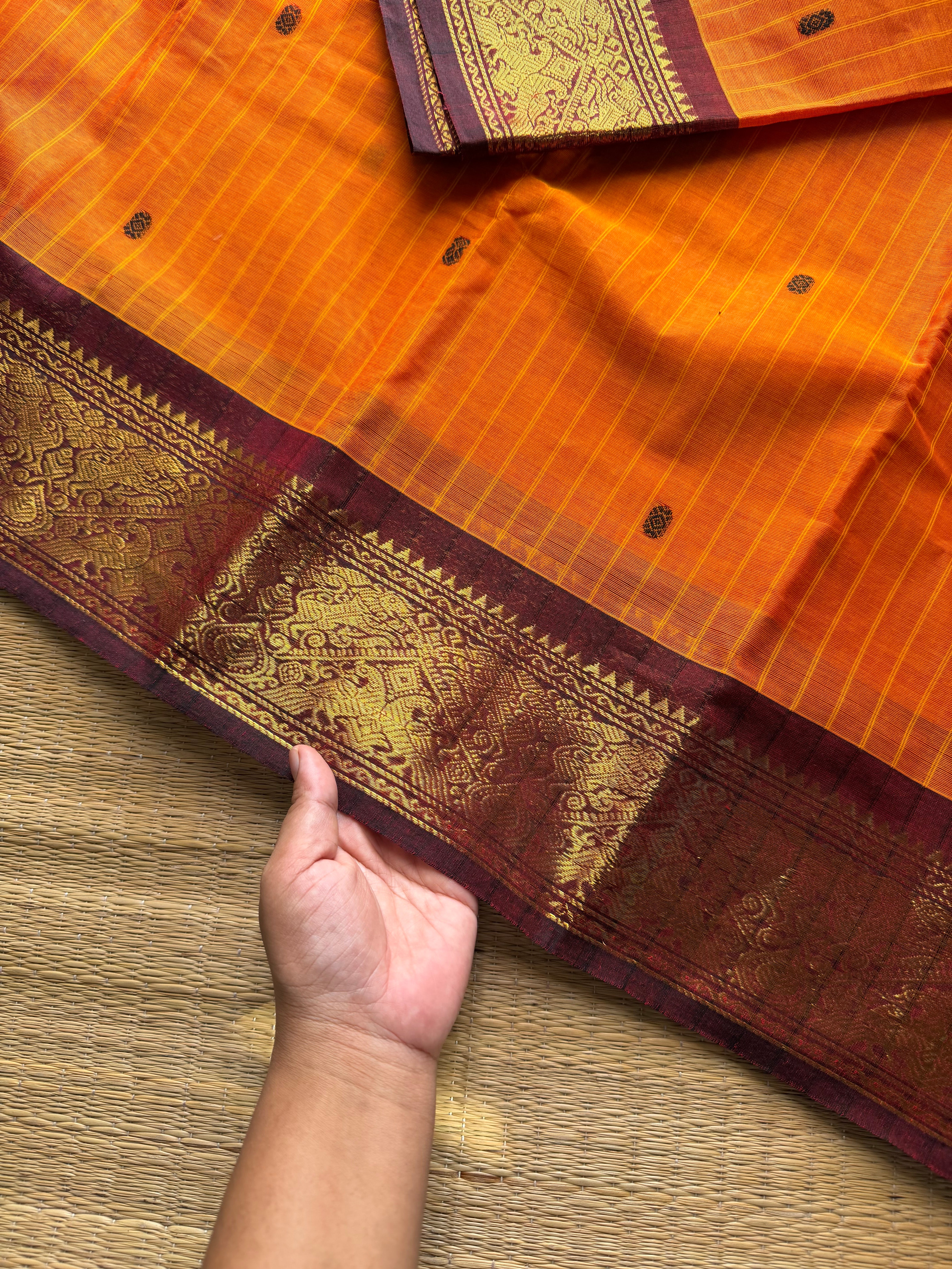 RF1073 Orange with maroon Vanasingaram border Kanchi cotton saree with handmade thread buttas and vertical stripped lines
