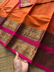 RF701 Orange shade Kanchi cotton saree with Rettapet border & handmade thread buttas