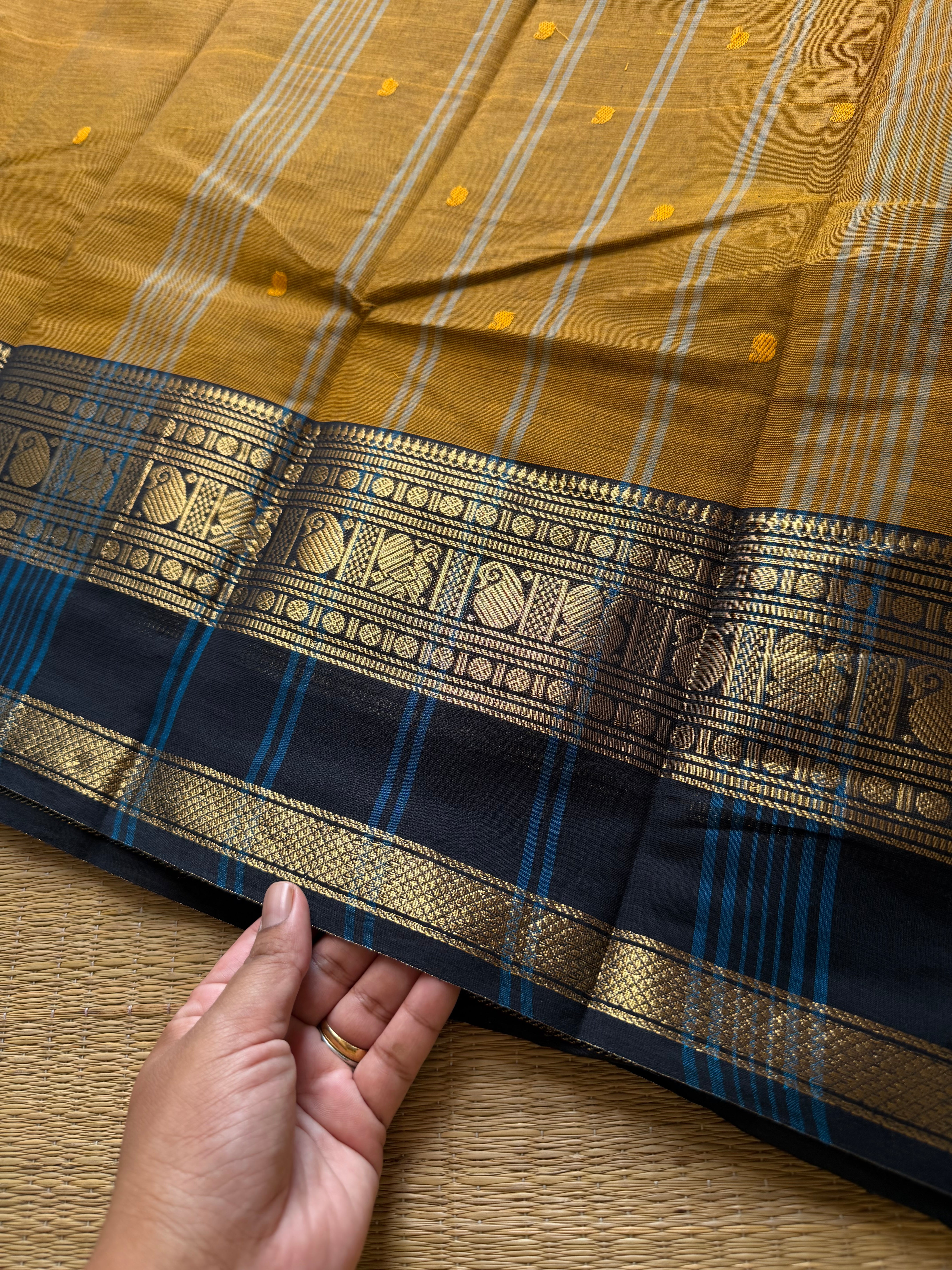 RF703 Mustard with black combination Kanchi cotton saree with handmade thread buttas