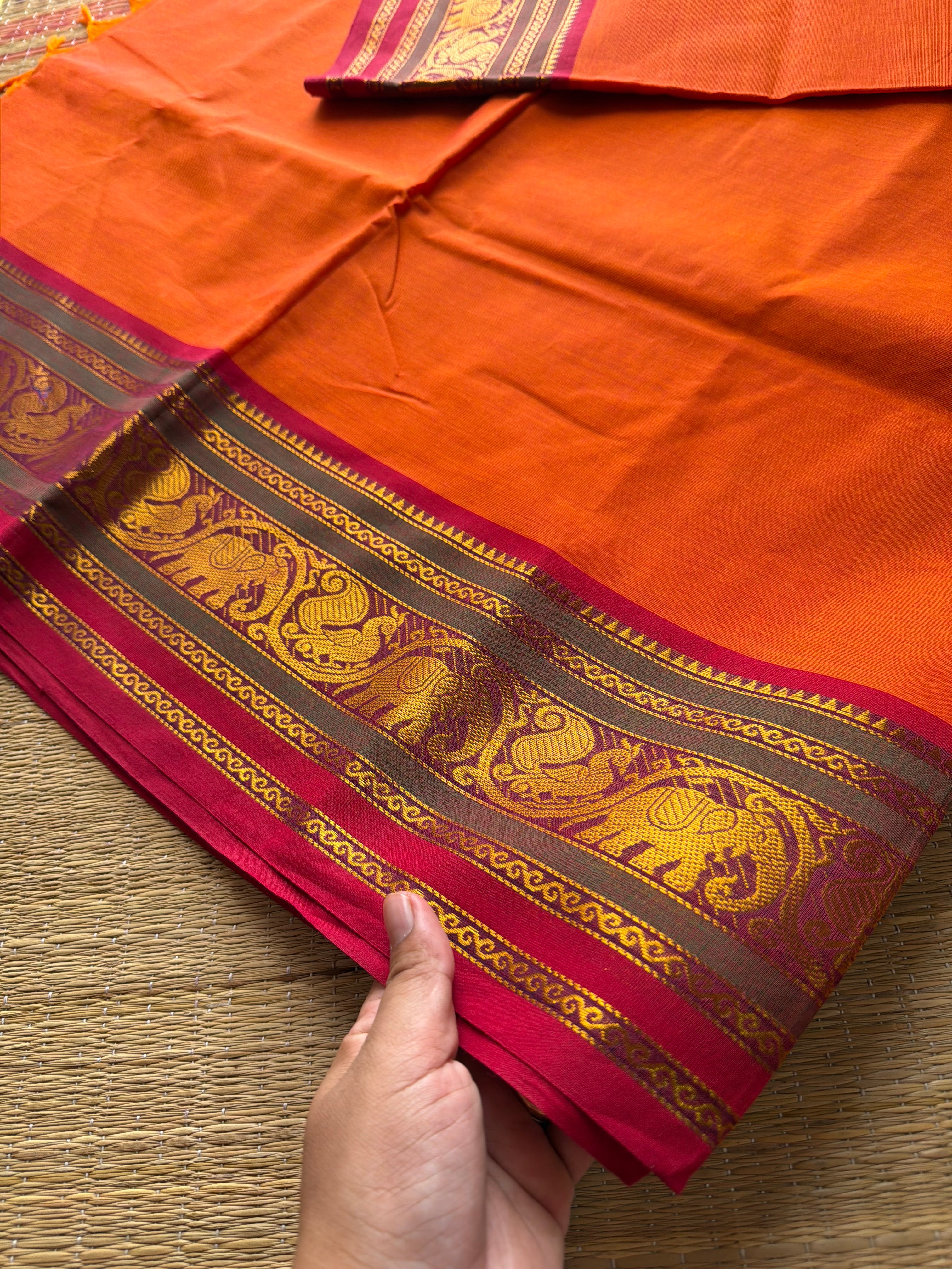 Orange with red & green combination Kanchi cotton saree with Annam & elephant pattern contrast double color border