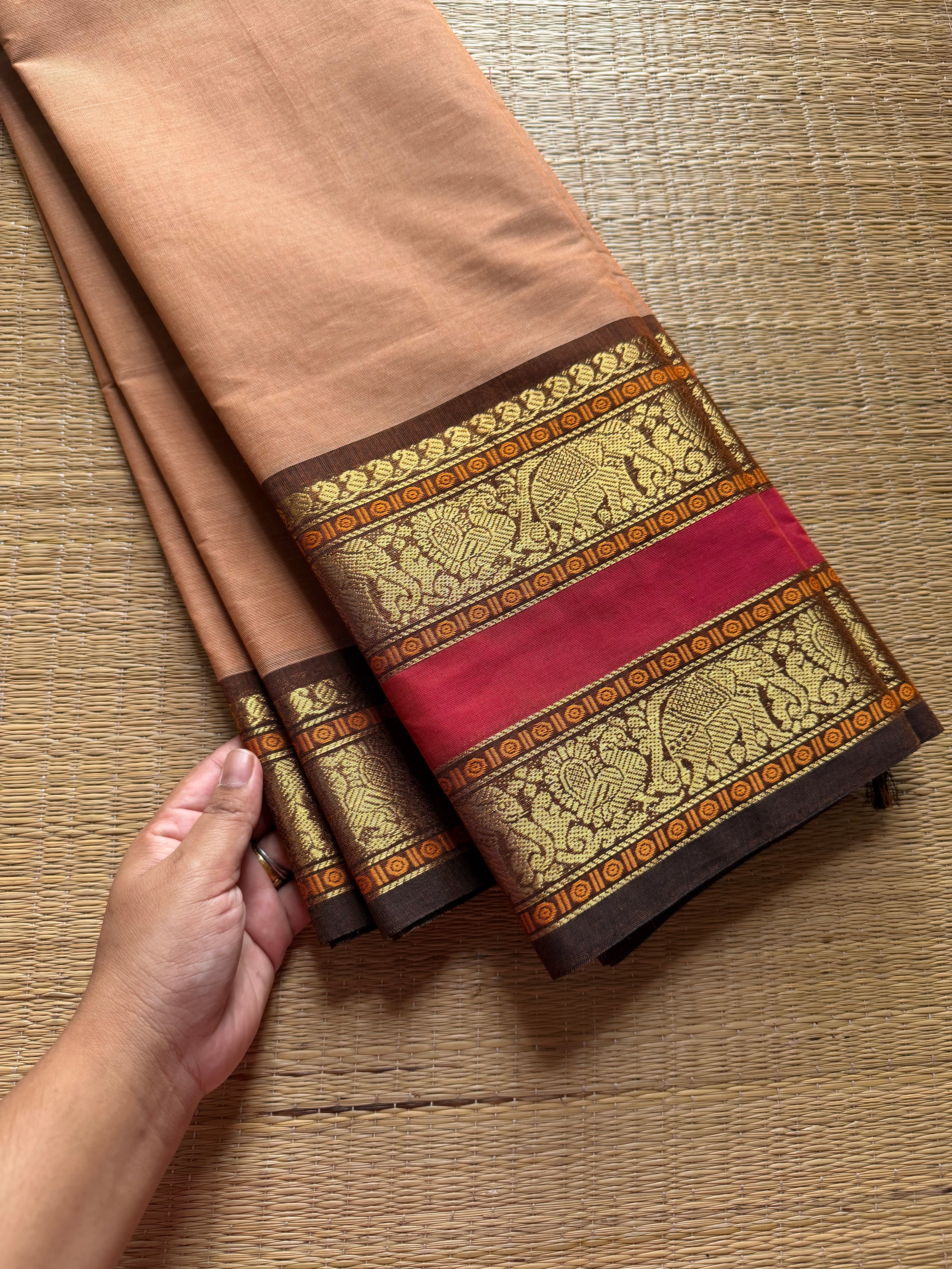 Beige shade Kanchi cotton saree with Rettapet border