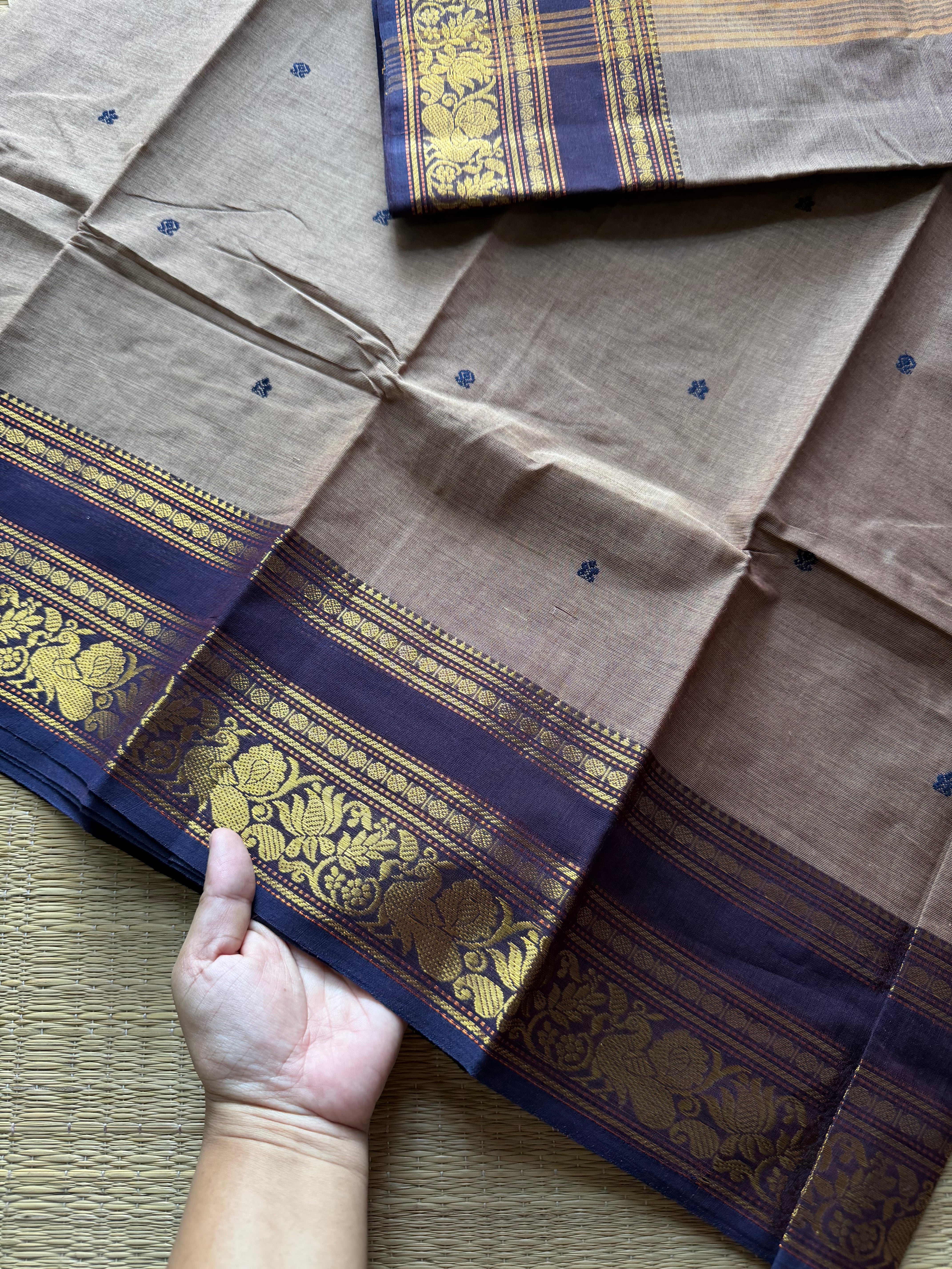 Dual tone biscuit shade Kanchi cotton saree with Annam & lotus pattern contrast border and handmade thread buttas