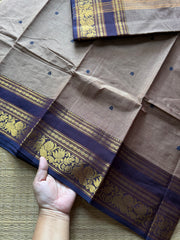 Dual tone biscuit shade Kanchi cotton saree with Annam & lotus pattern contrast border and handmade thread buttas