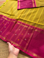Dual tone green and yellow mixed shade with contrast pink combination Vintage l Border Kanchi Cotton Saree With kattam / checks pattern & handwoven Buttas on the border