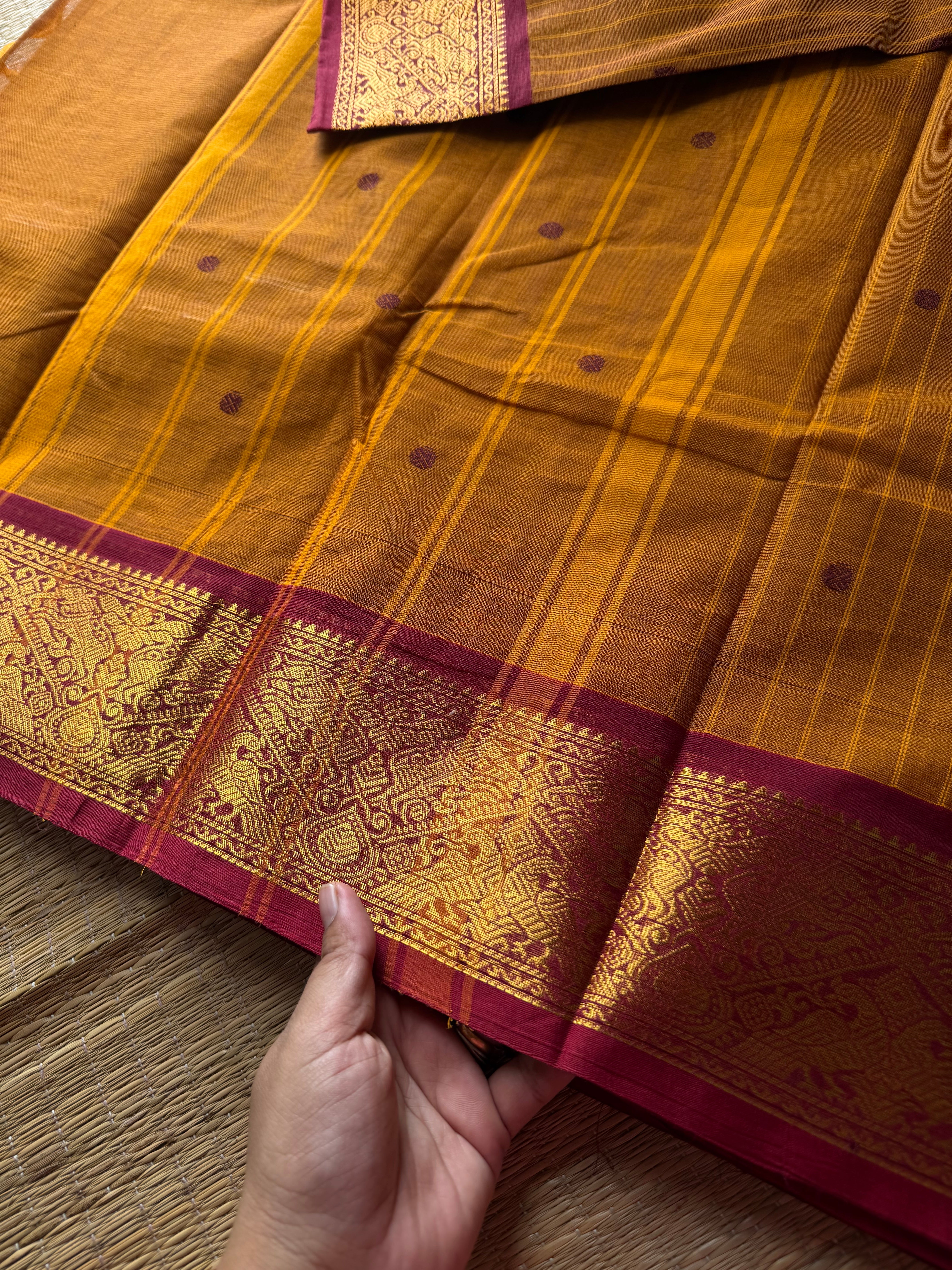 RF536 Dual tone orange with contrast maroon combination Kanchi cotton saree with Vanasingaram border and handmade thread buttas