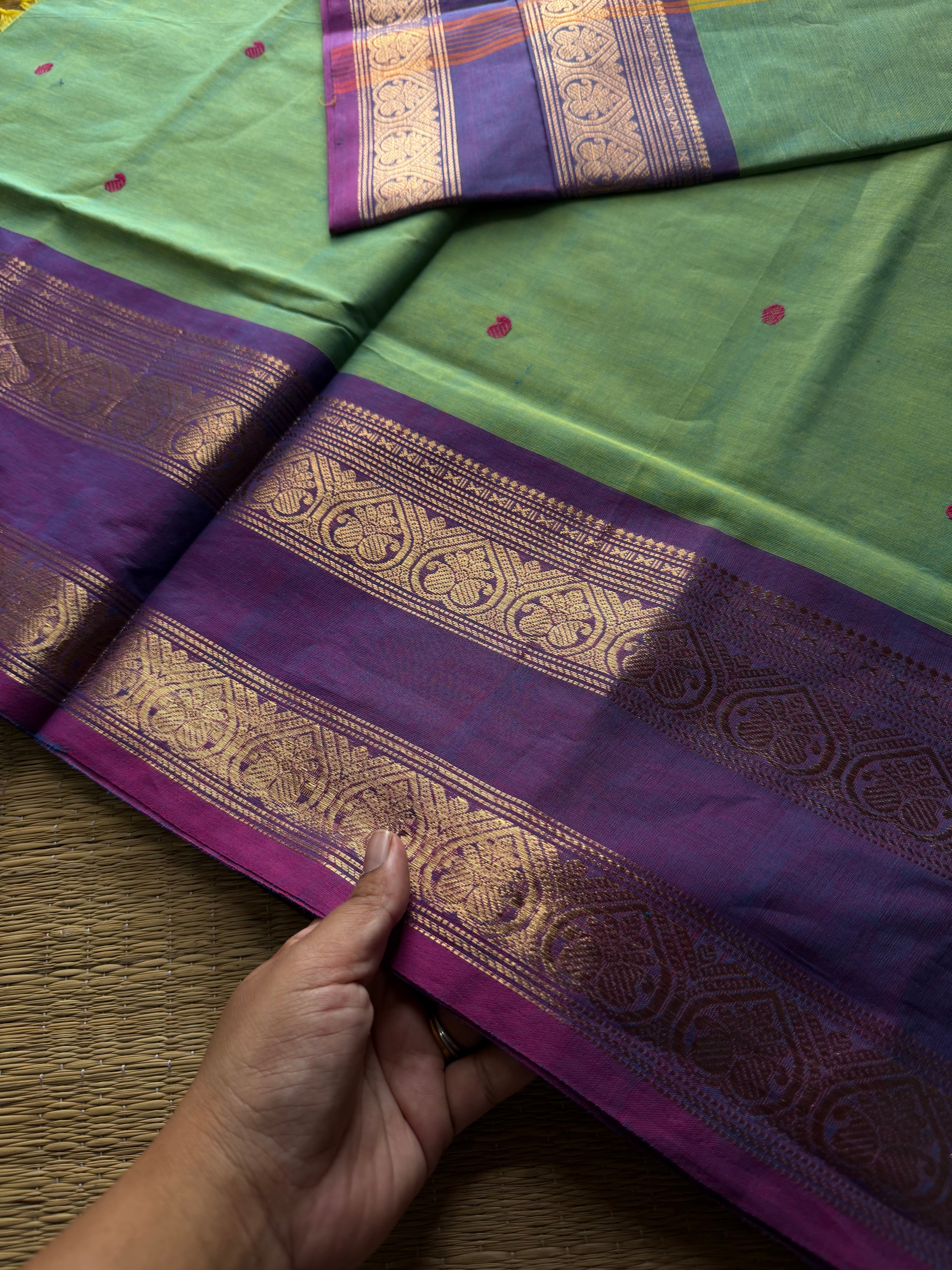 Apple green shade Kanchi cotton saree with handmade thread buttas