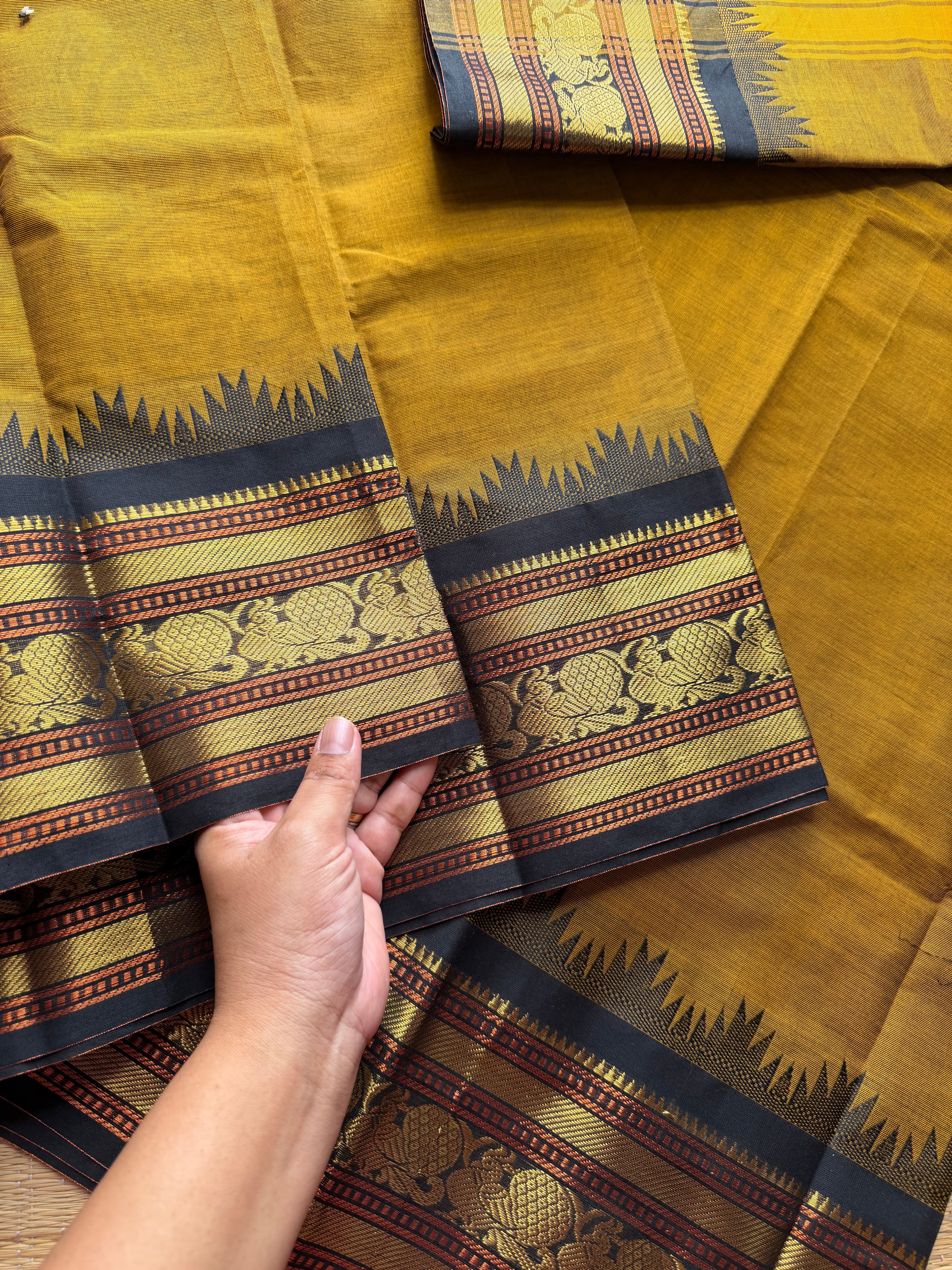 RF493 Mustard with black combination Thazhampoo pattern Kanchi cotton saree
