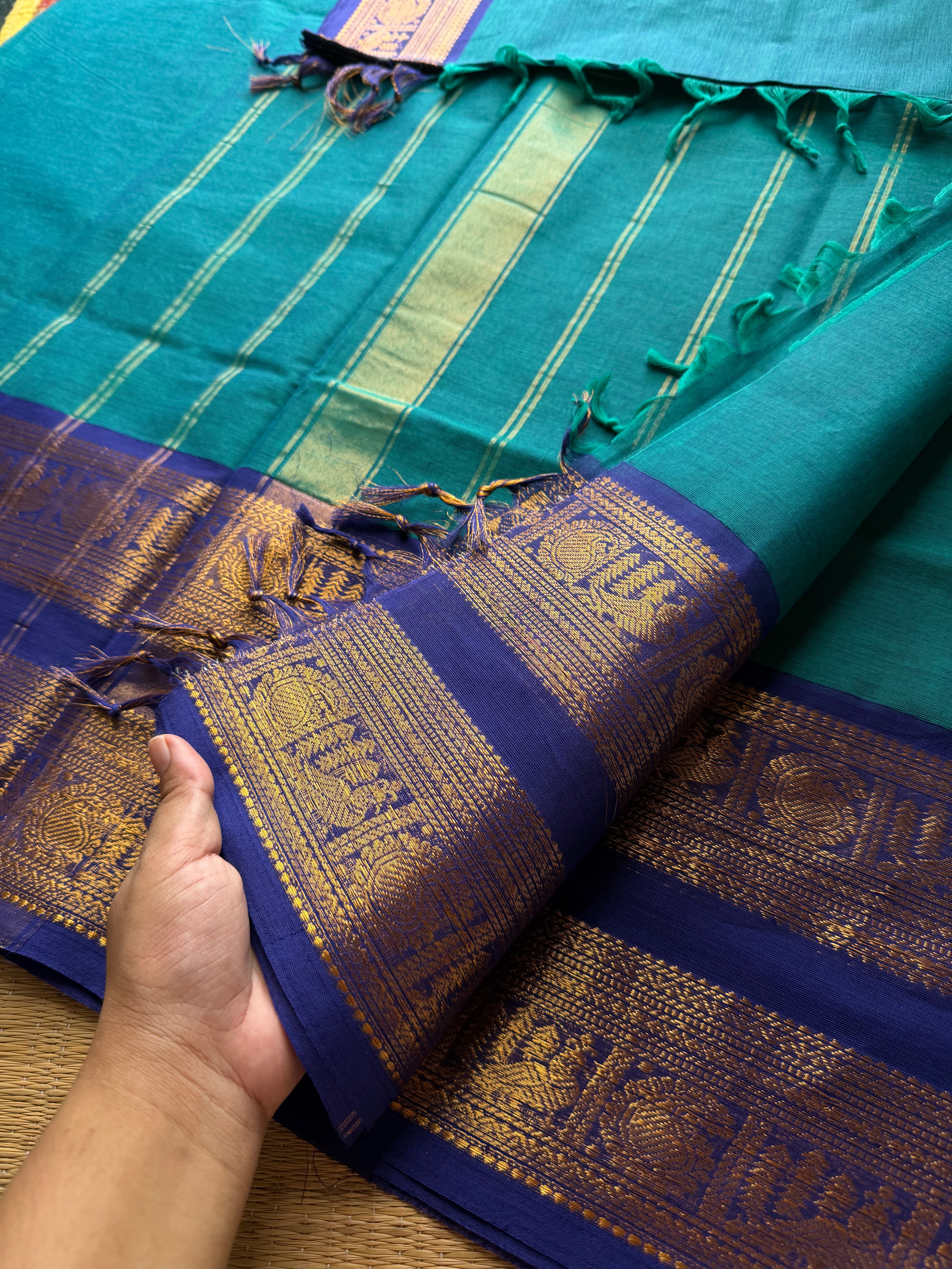 Peacock blue shade Kanchi cotton saree with Rettapet border