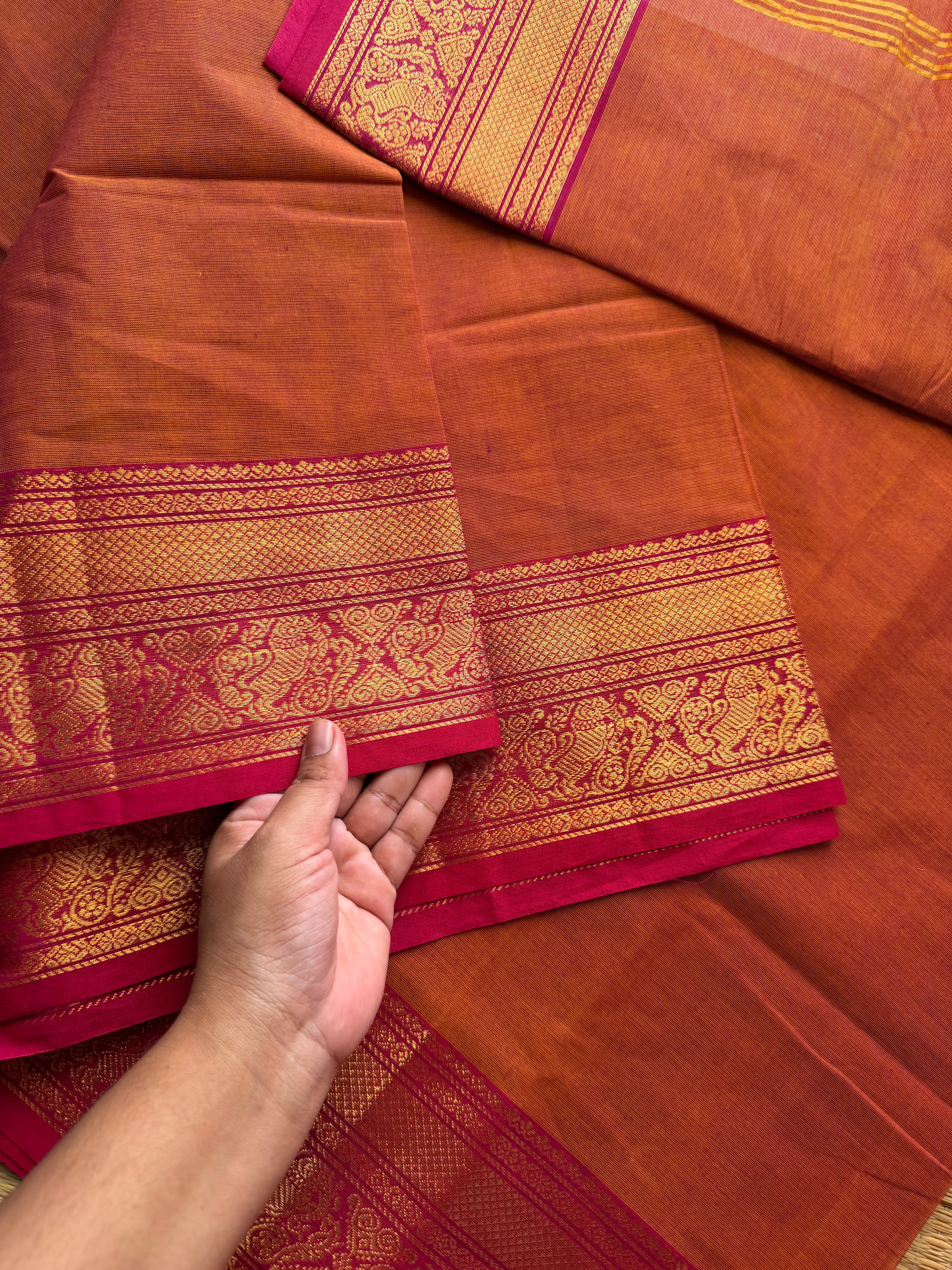 RF327 Dual tone orange shade Kanchi cotton saree with unique Yazhi pattern contrast border