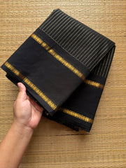 Monotone black shade Kanchi cotton saree with vintage gap border and fully golden Vairaoosi pattern