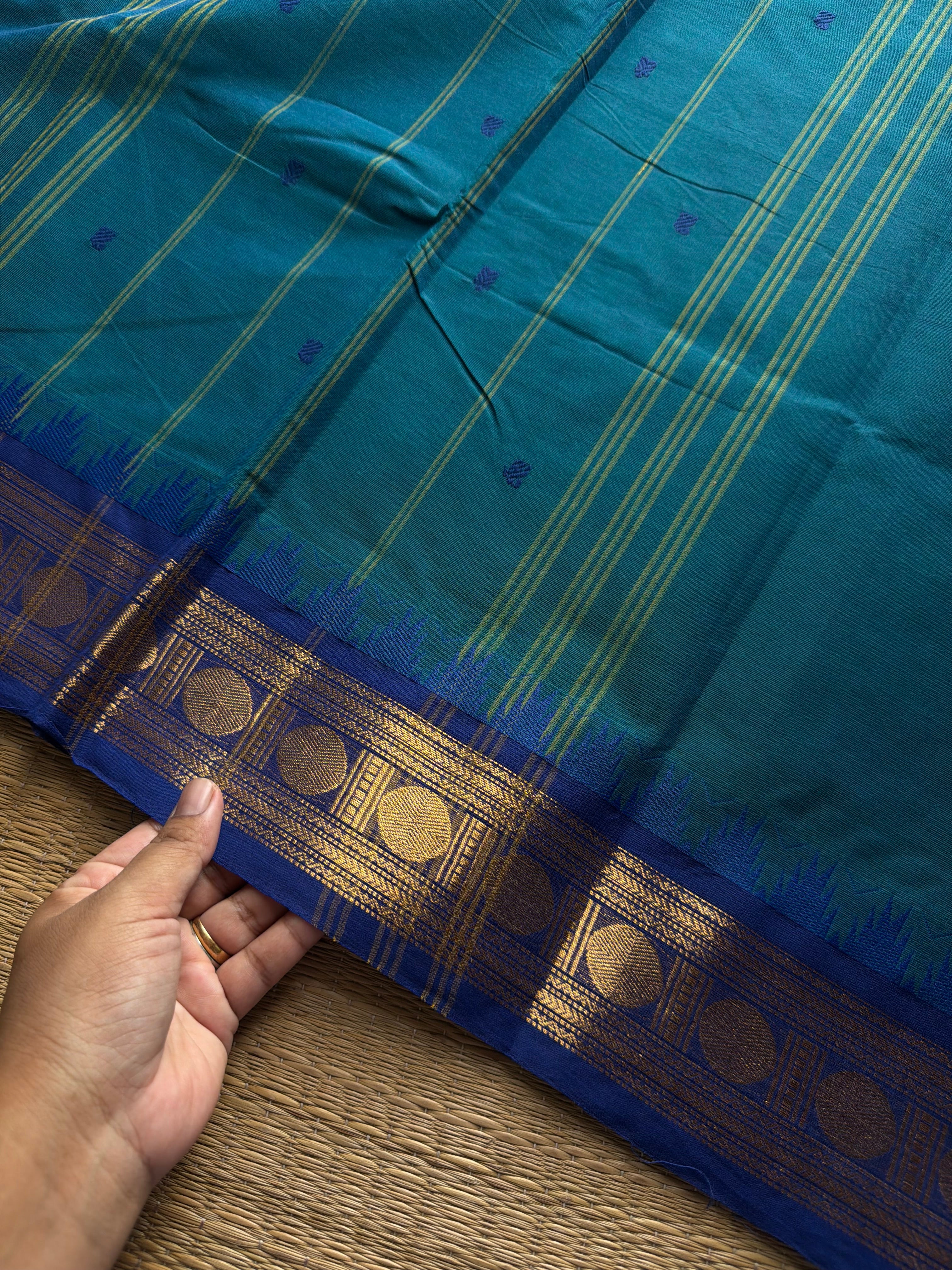 RF1022 Peacock blue shade Kanchi cotton saree with handmade thread buttas