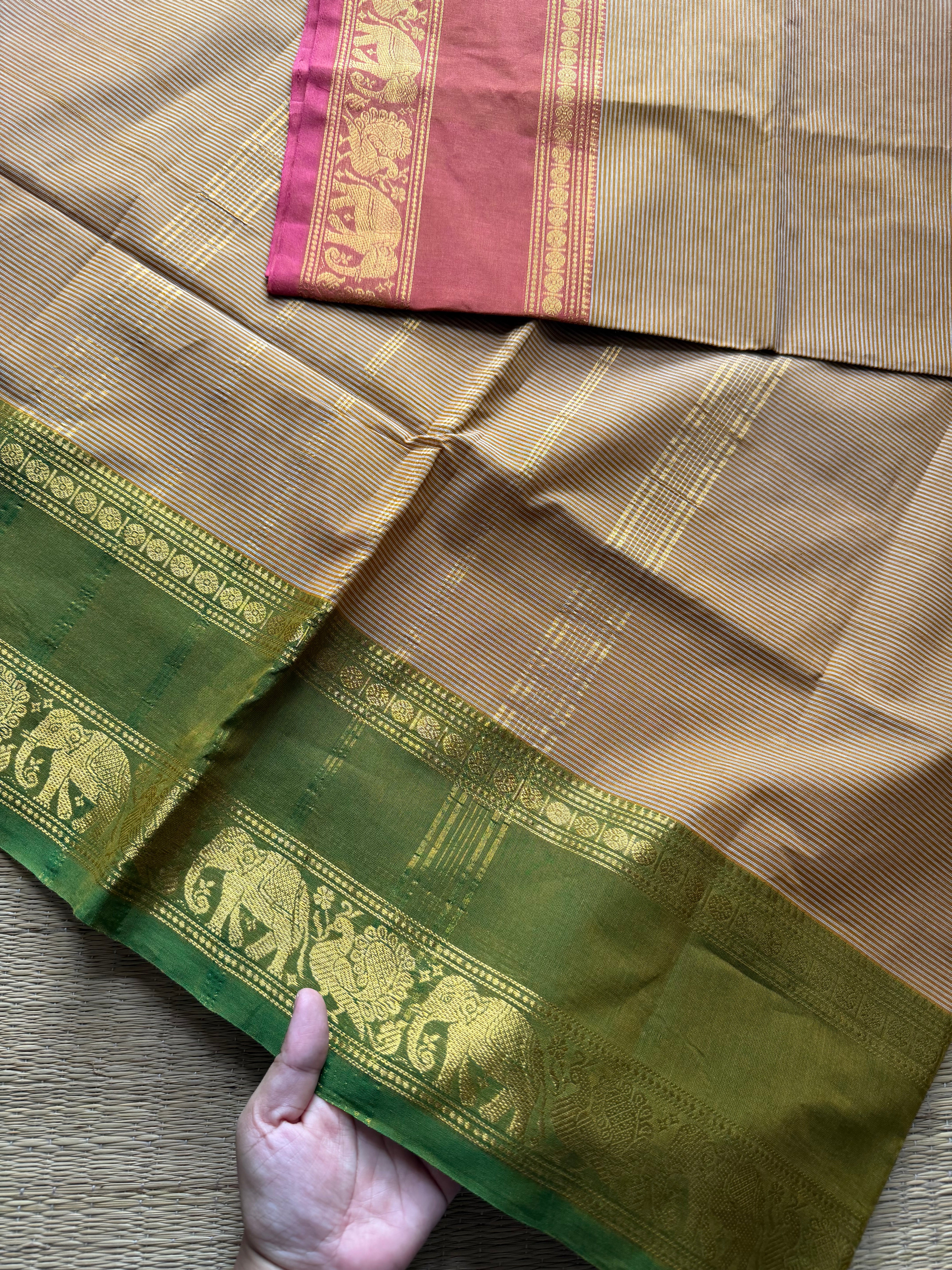 Beige shade Kanchi cotton saree with small horizontal stripped pattern with unique Ganga Jamuna border