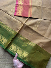 Beige shade Kanchi cotton saree with small horizontal stripped pattern with unique Ganga Jamuna border
