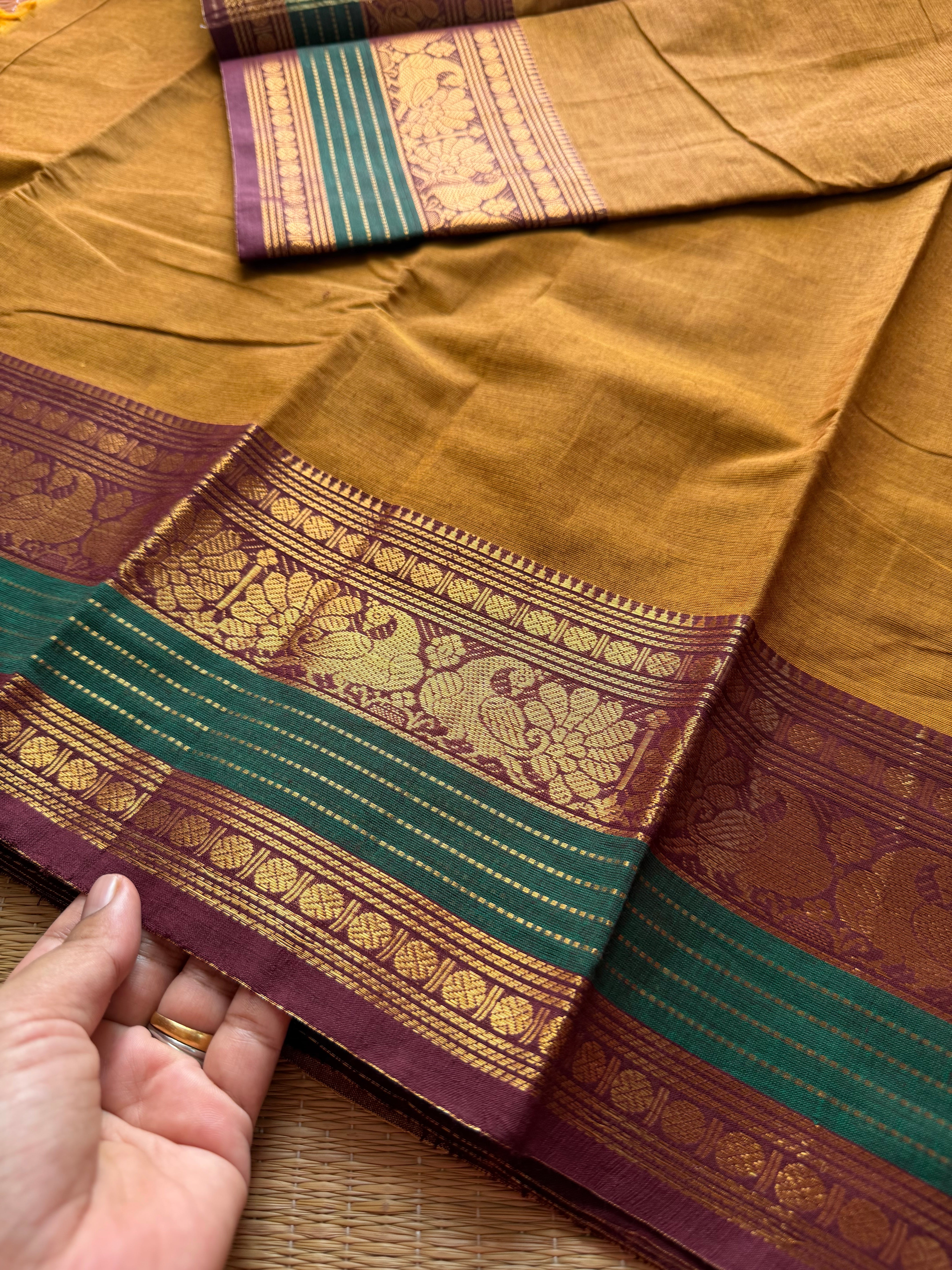 RF179 Mustard with contrast brown and green peacock pattern Kanchi cotton saree