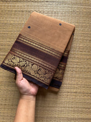 Beige shade Kanchi cotton saree with contrast Annam and lotus pattern border & handmade thread buttas
