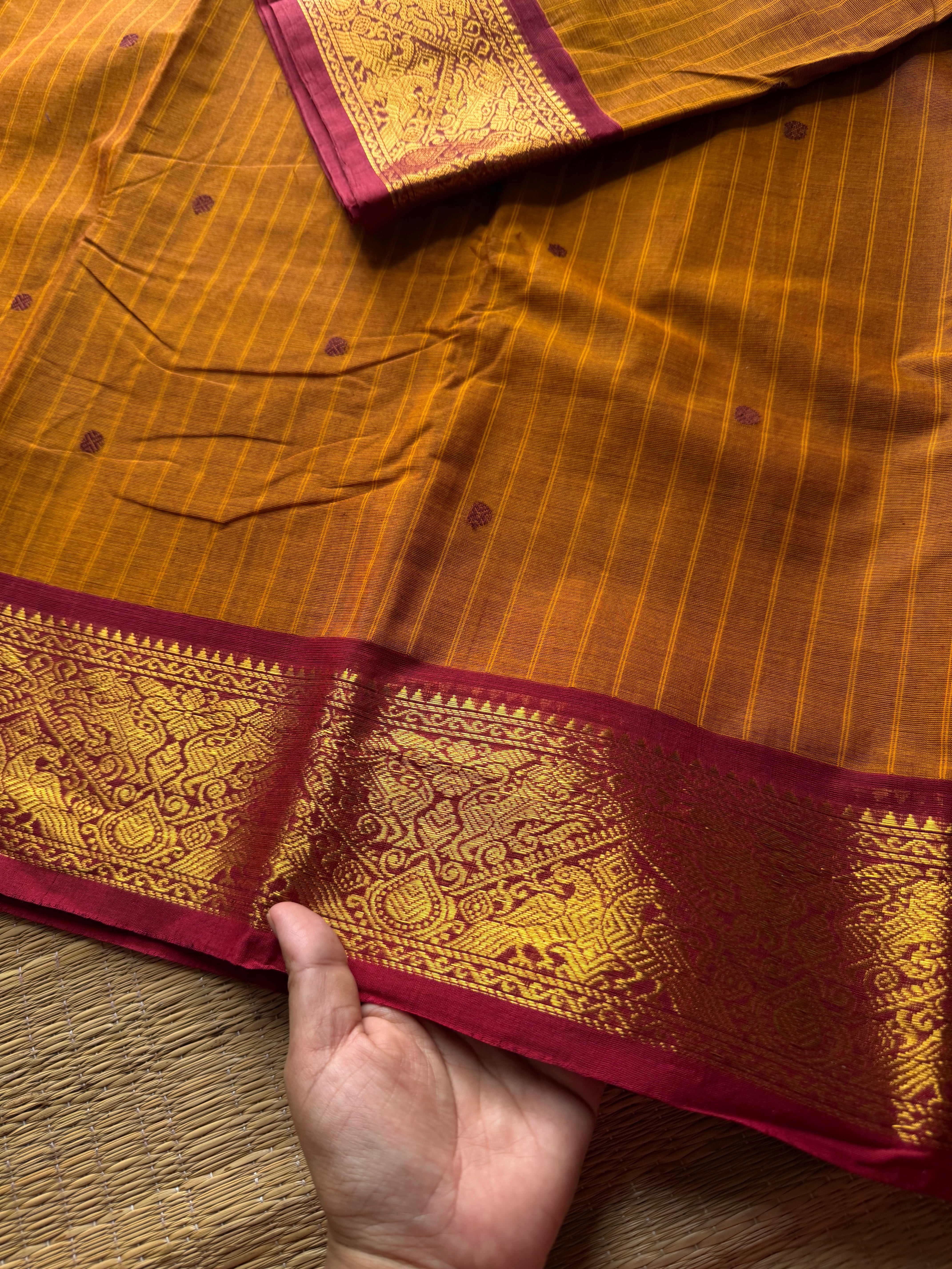 RF536 Dual tone orange with contrast maroon combination Kanchi cotton saree with Vanasingaram border and handmade thread buttas