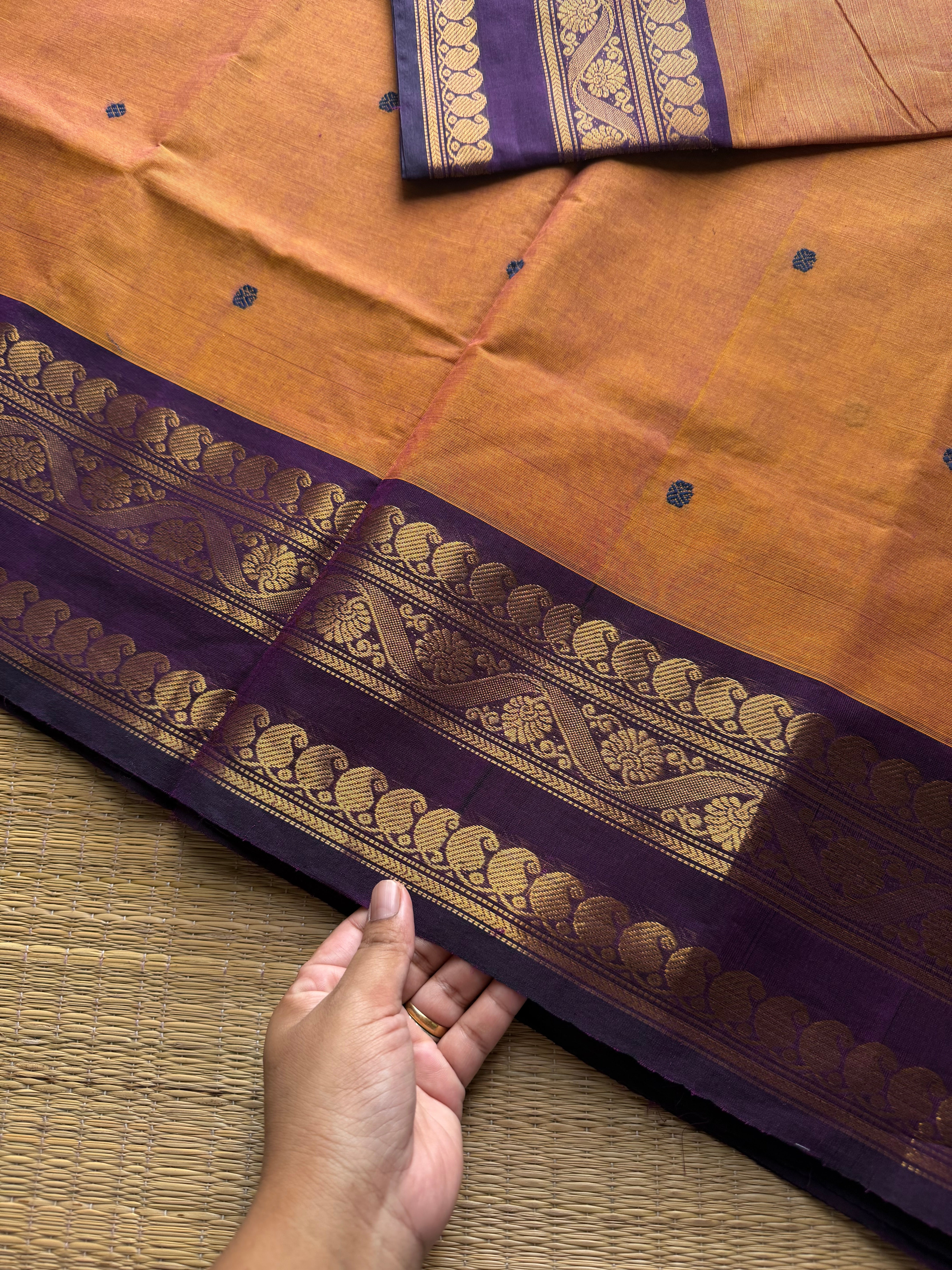 RF1027 Dual tone mango shade with contrast purple border Kanchi cotton saree with handmade thread buttas
