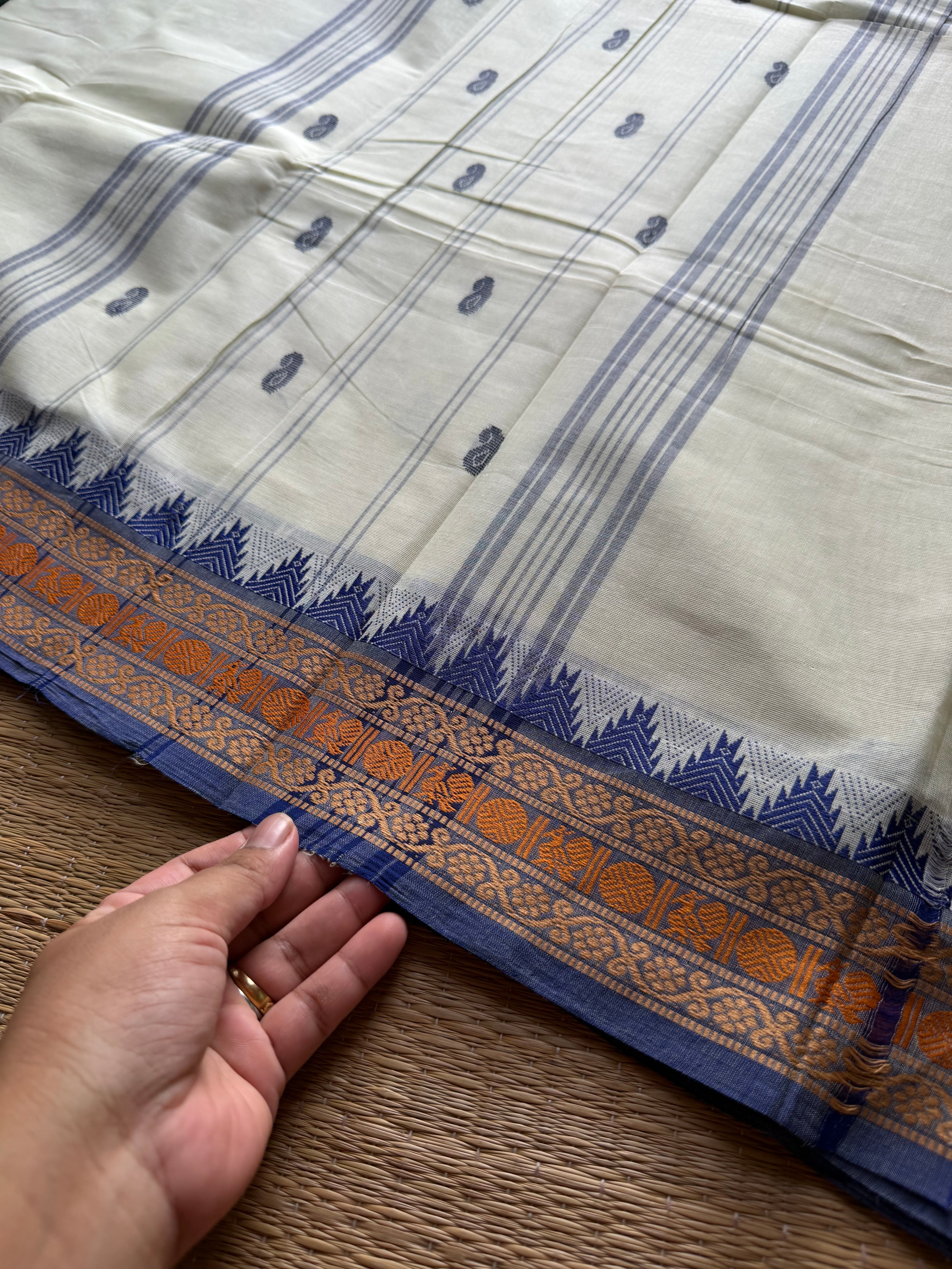 Elegant Thread Border ~ Pastel shade Kanchi Cotton Saree with small Thazhampoo pattern thread border & handmade thread buttas