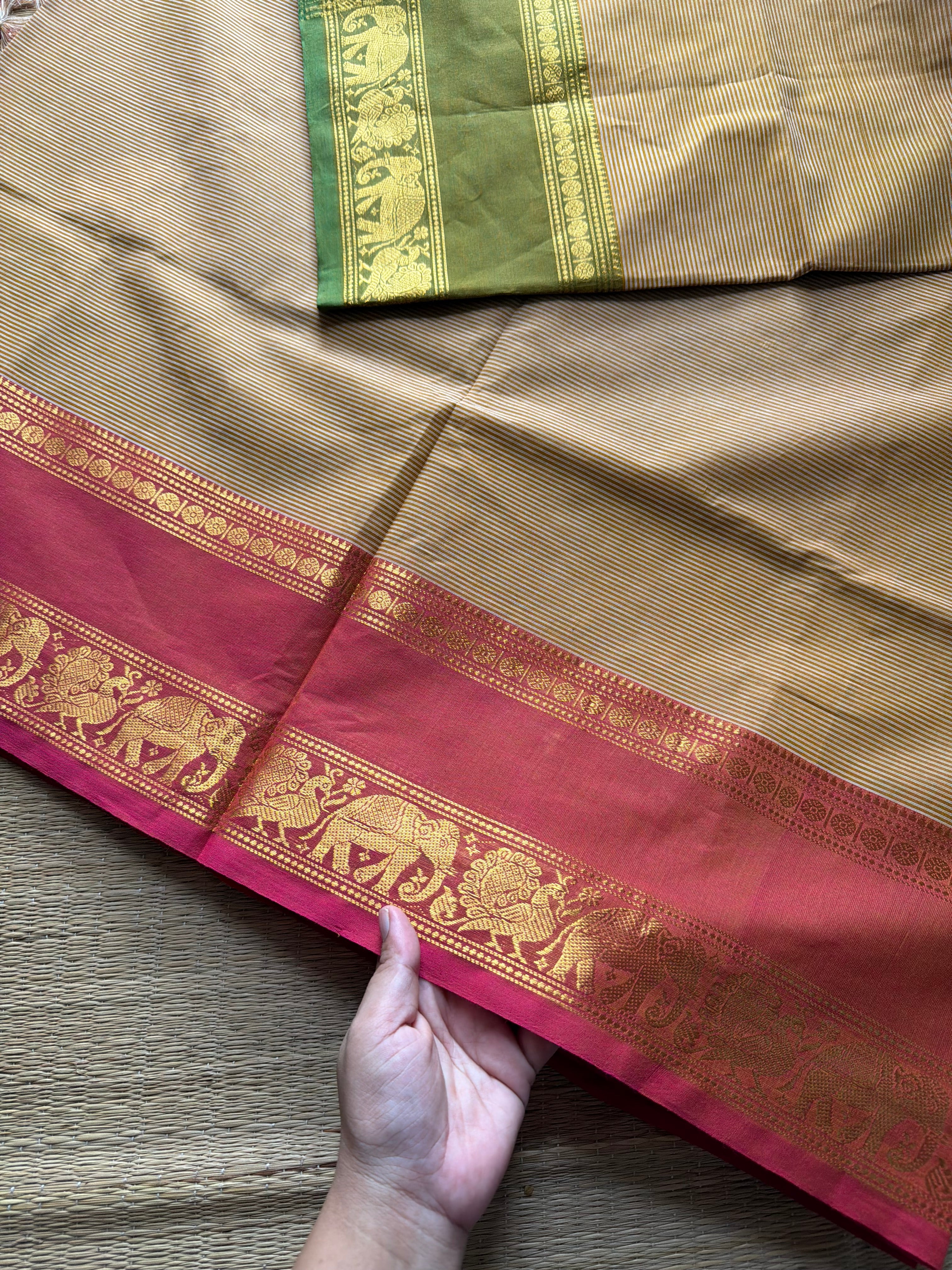 Beige shade Kanchi cotton saree with small horizontal stripped pattern with unique Ganga Jamuna border