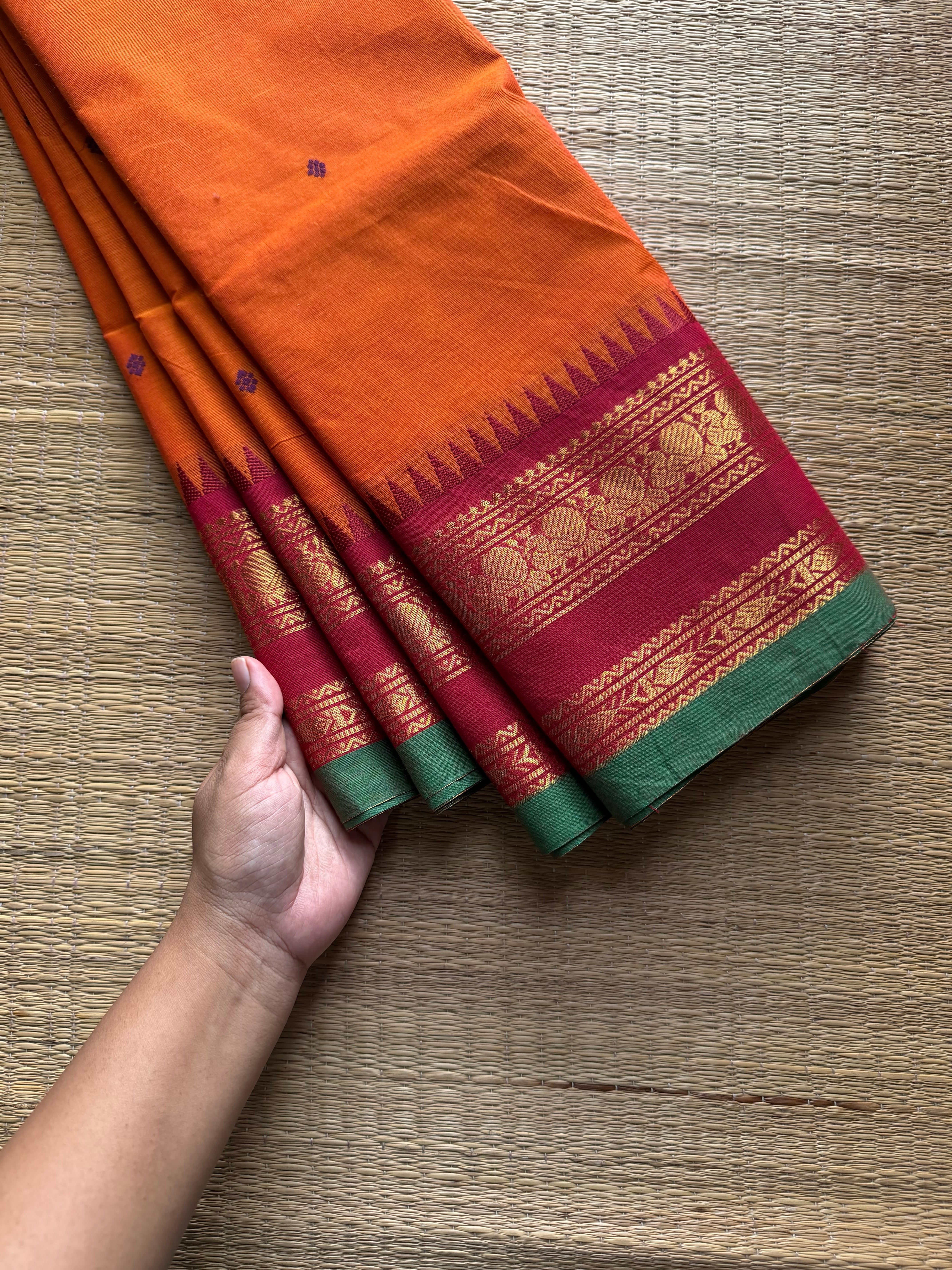 RF864 Orange shade Kanchi cotton saree with handmade thread buttas